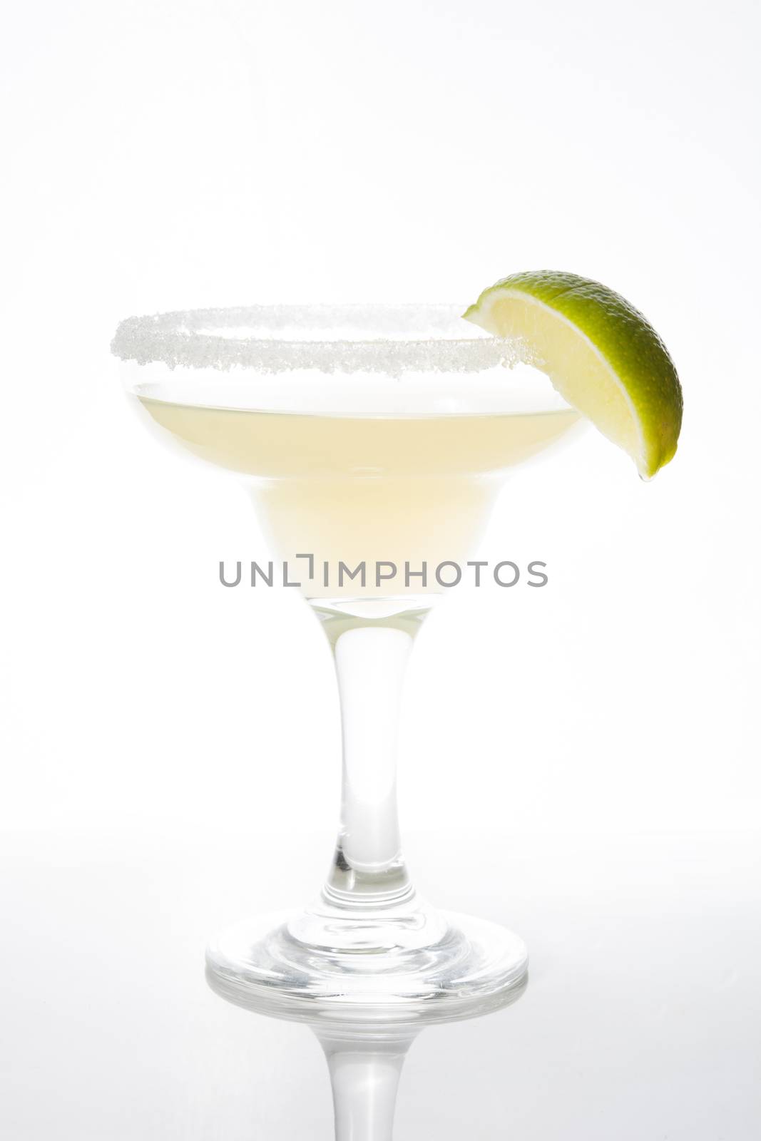 Margarita cocktails with lime in glass isolated on white background