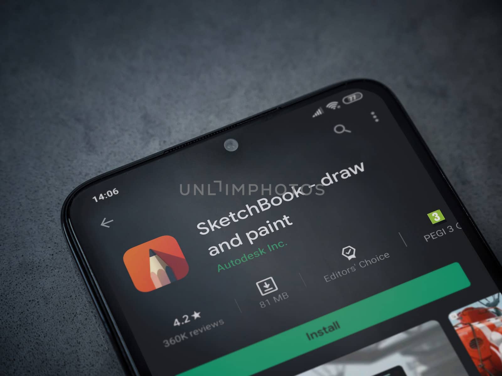 Lod, Israel - July 8, 2020: Autodesk SketchBook - draw and paint app play store page on the display of a black mobile smartphone on a dark marble stone background. Top view flat lay with copy space.