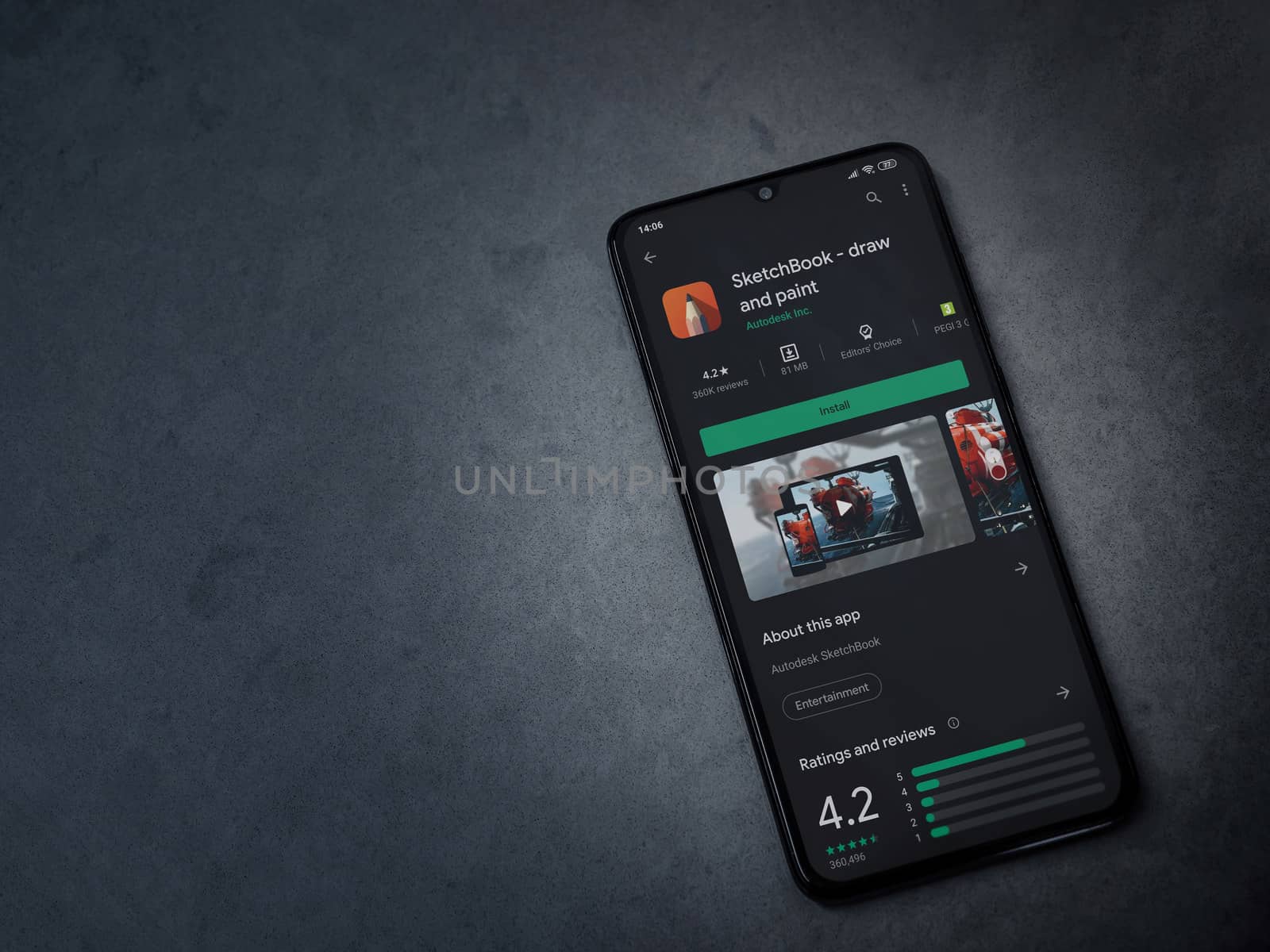 Lod, Israel - July 8, 2020: Autodesk SketchBook - draw and paint app play store page on the display of a black mobile smartphone on a dark marble stone background. Top view flat lay with copy space.
