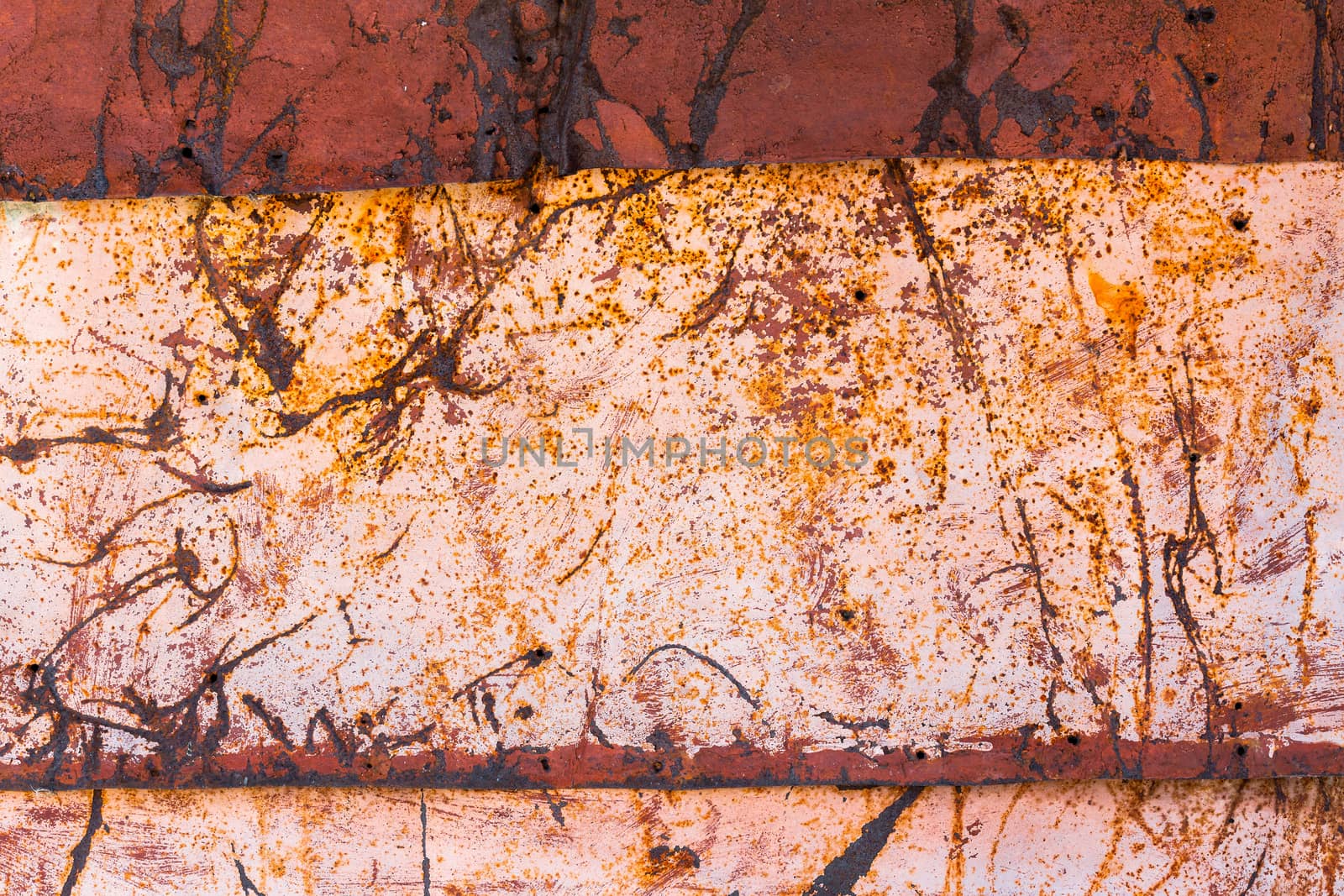 scratched wall tin iron sheet with old brown and white paint