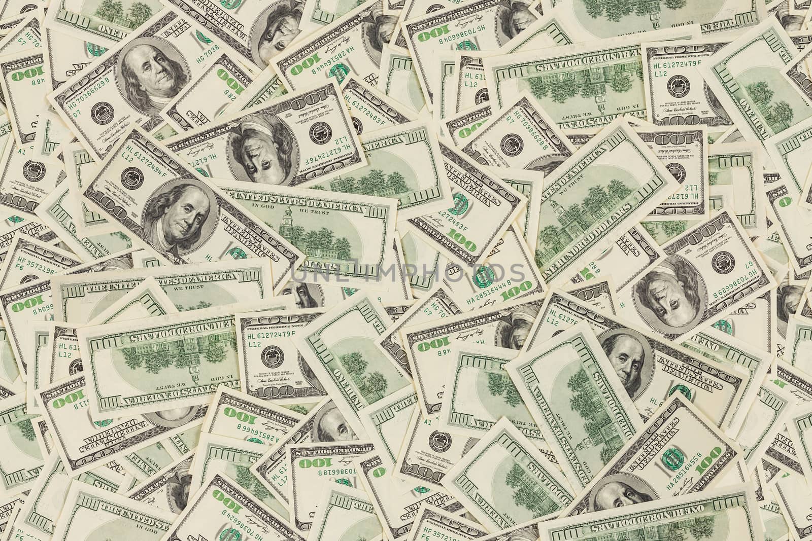flat seamless texture and background of real one hundred united states of america dollar banknotes, both sides in random pattern
