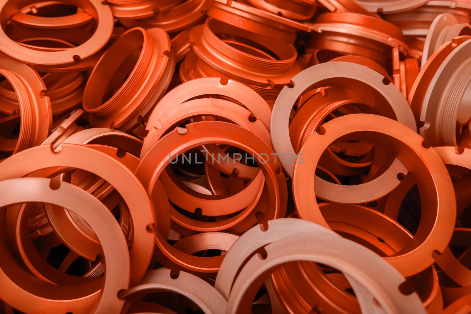 an abstract background of lush lava color coated metal ring parts by z1b