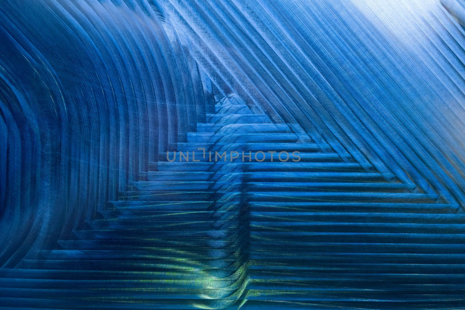 Large metal surface after end milling with specific concentric notches and light reflections. Top-down closeup technique