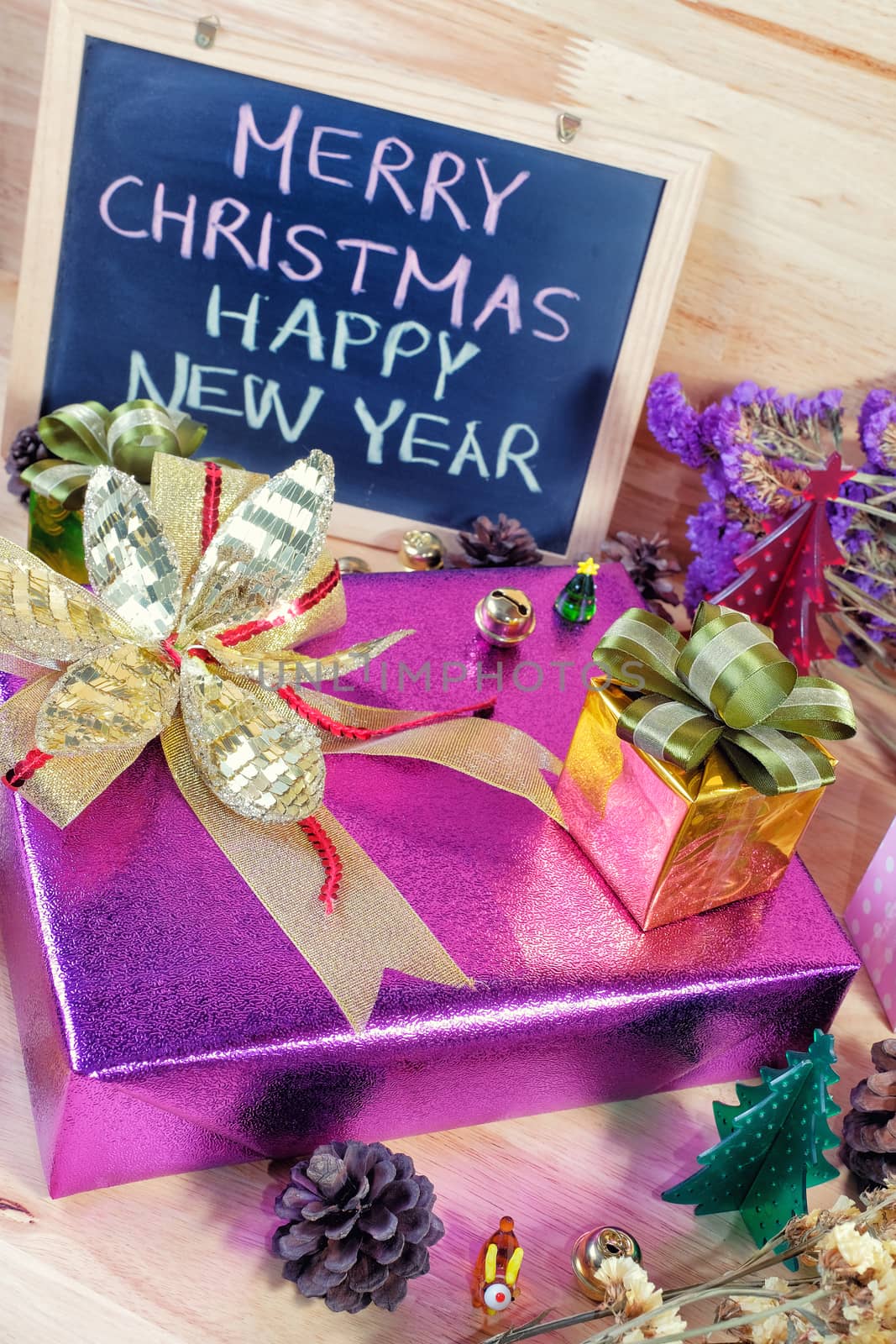 Merry Christmas and Happy New Year - present boxes with Xmas decorations