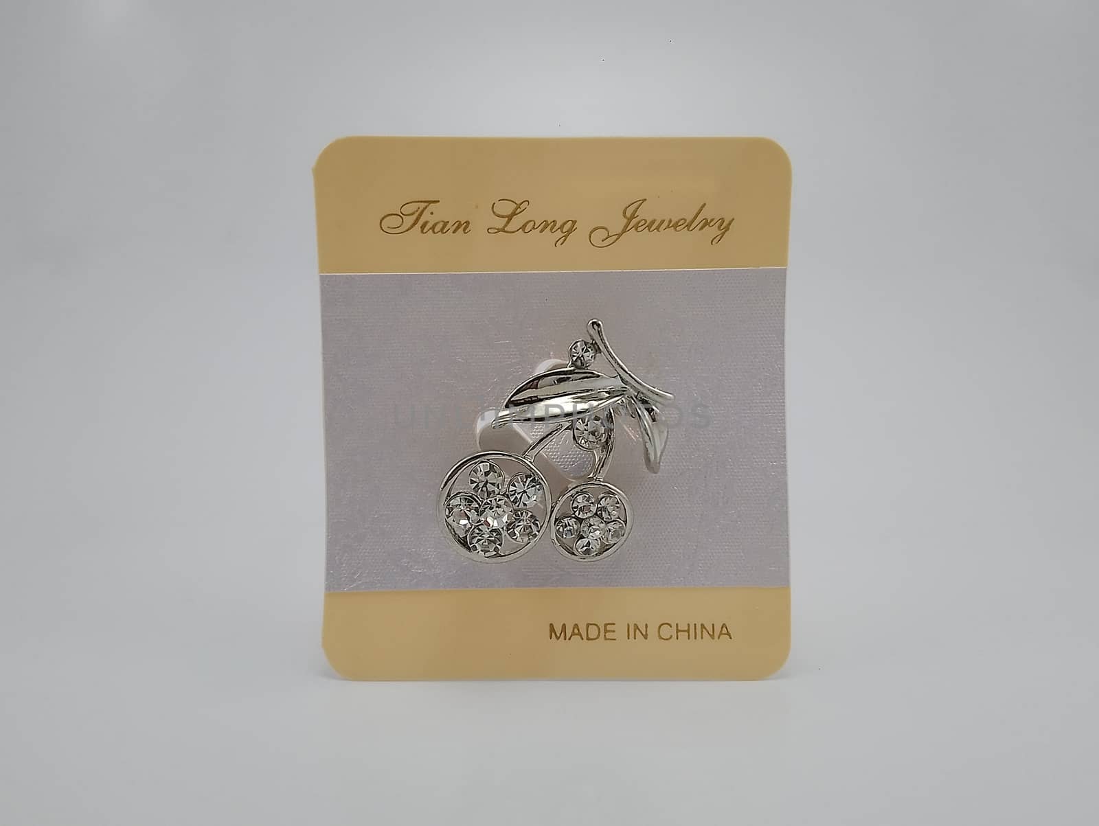 QUEZON CITY, PH - JULY 28 - Tian Long jewelry metal brooch pin on July 28, 2020 in Quezon City, Philippines.