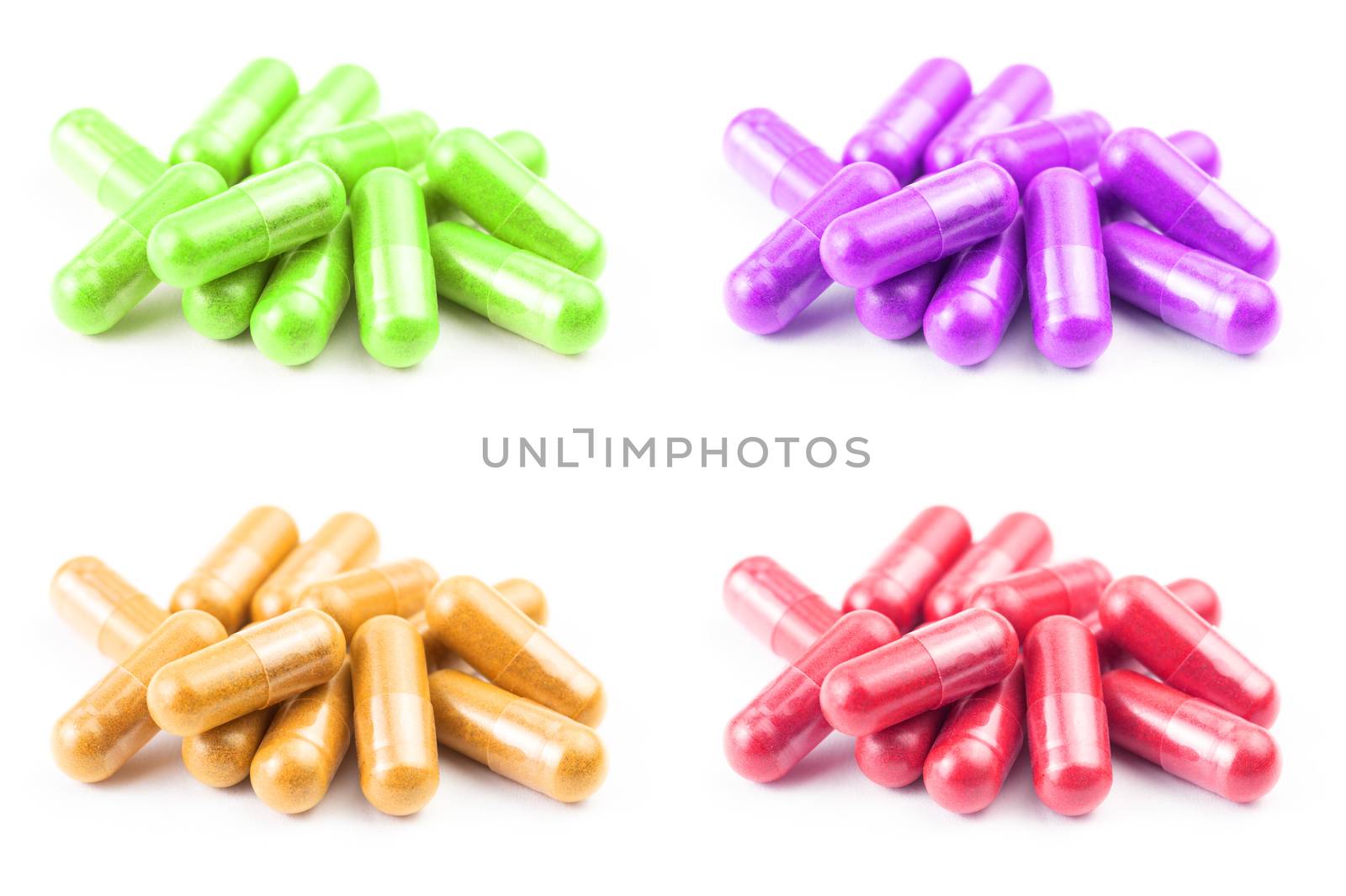 set of of colored organic capsules isolated on white background closeup with selective focus.