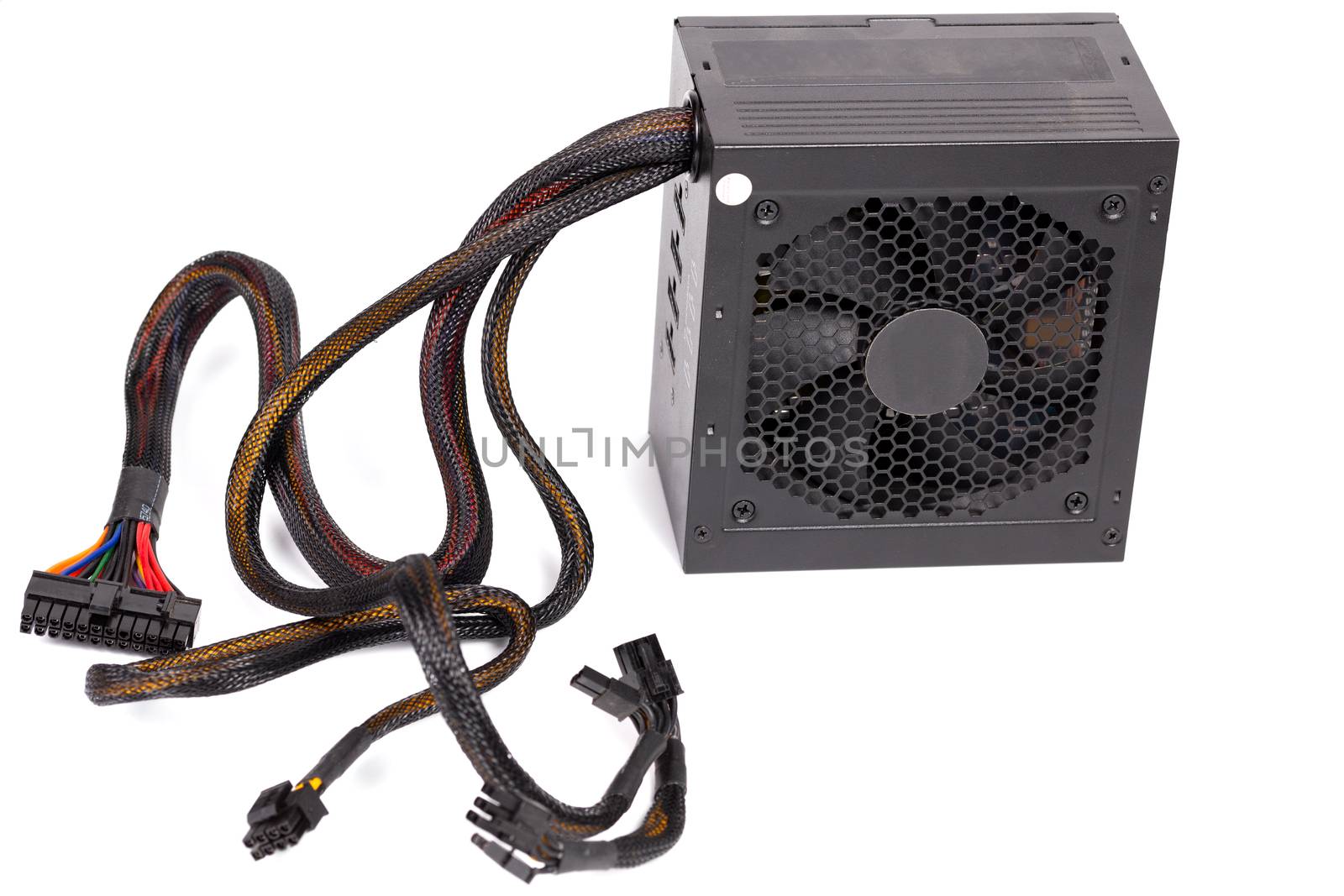 pc atx half-modular power supply isolated on white background with selective focus.