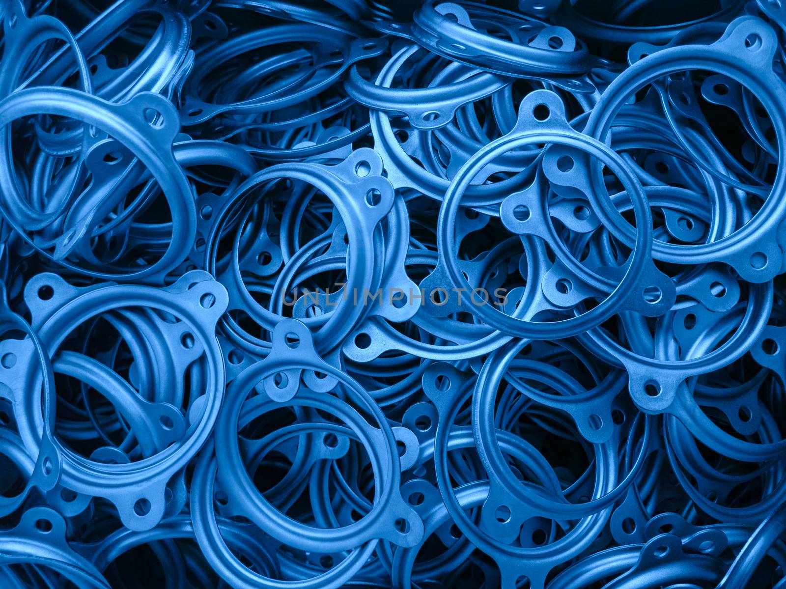 an abstract background of classic blue color coated metal stmped flange ring parts by z1b