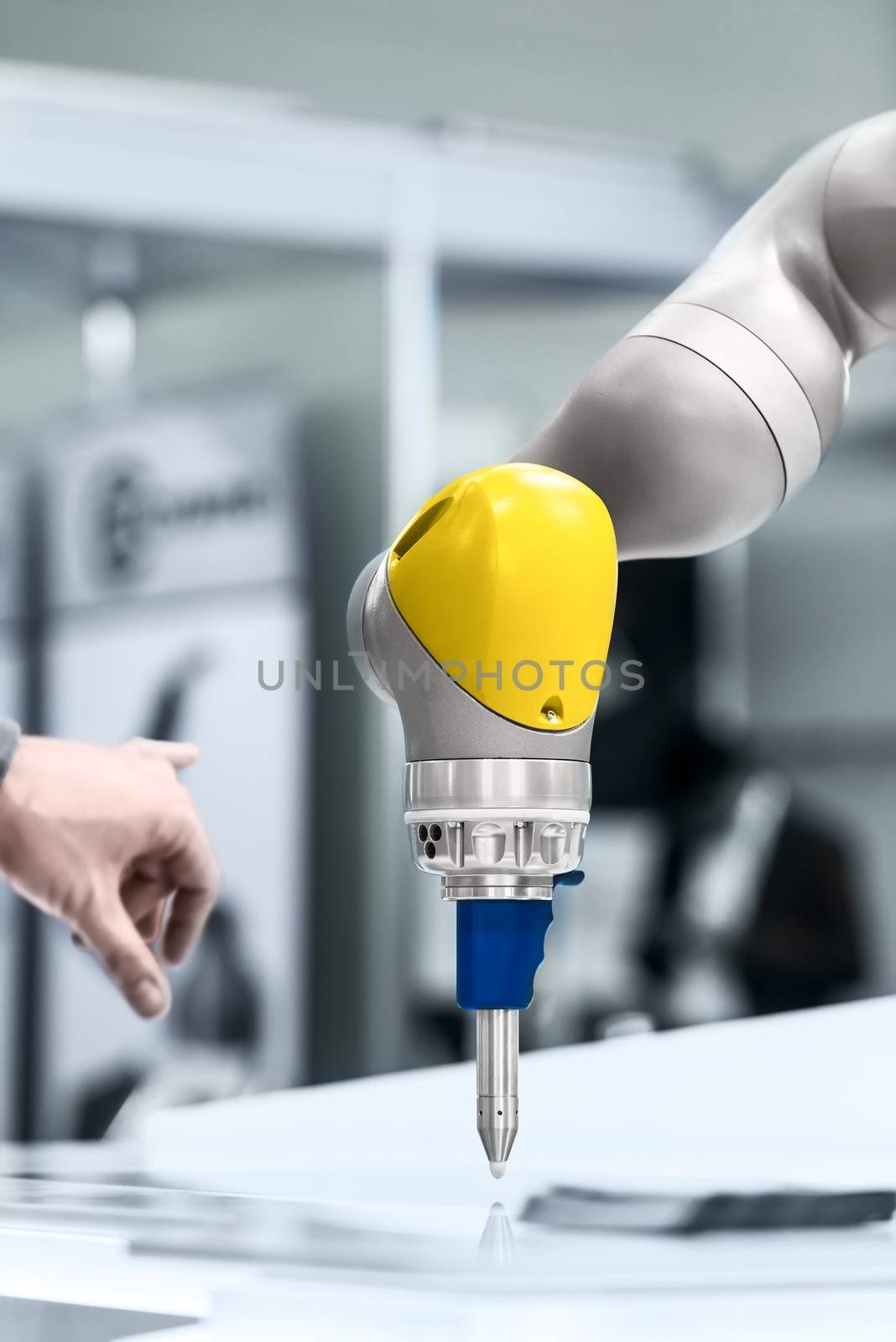 High technology robotic arm closeup photo in factory