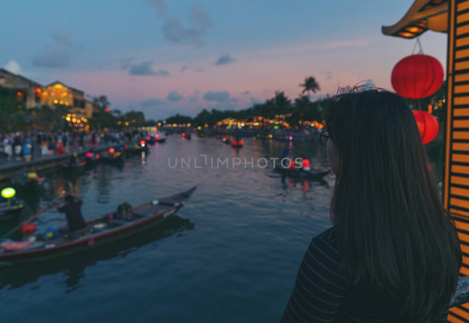 woman in Hoi An ancient town by anankkml