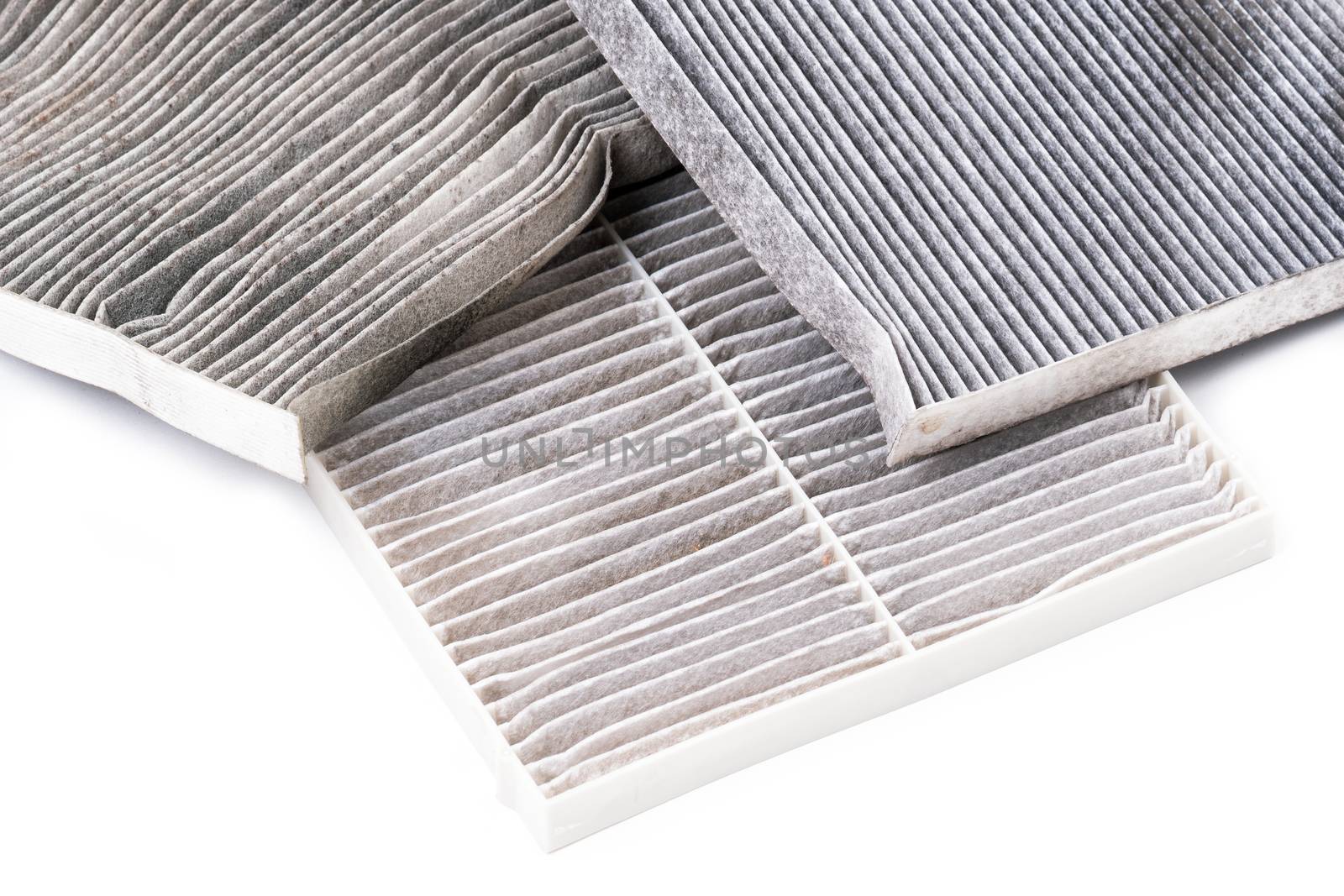 dirty car air conditioning filter isolated on white background