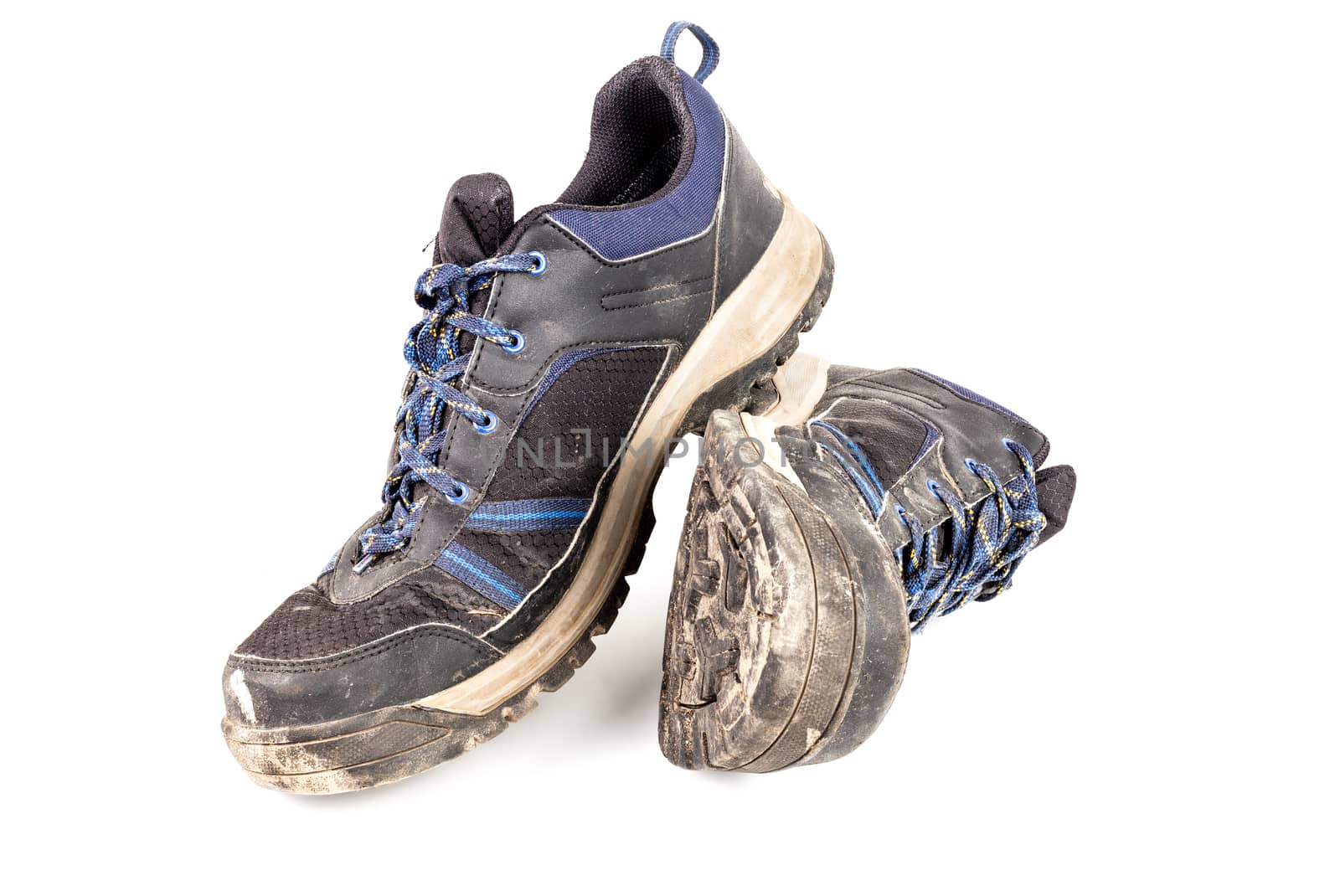 dirty used worn out black and blue outdoor empty clean lightweight waterproof sneakers isolated on white background