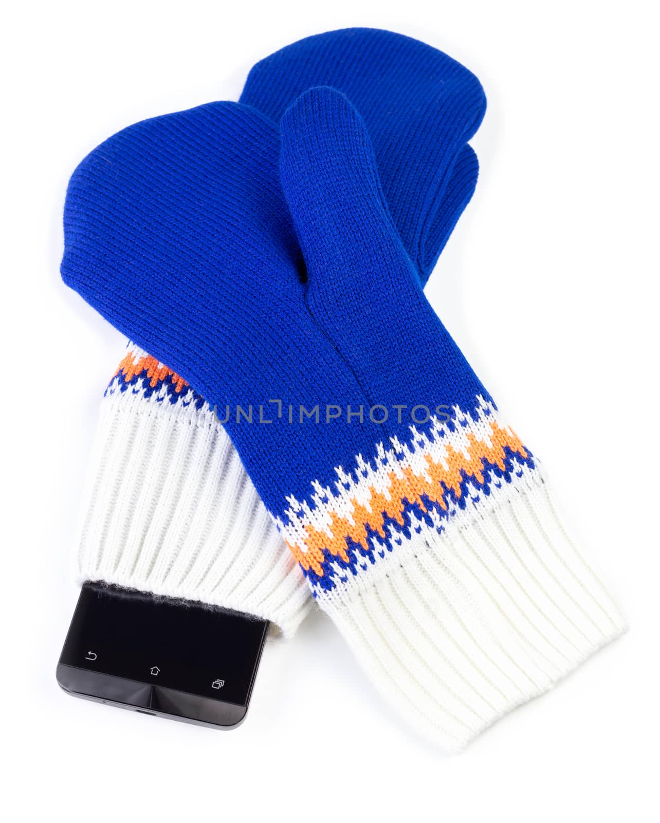 blue and white knited mittens with cellphone isolated on white background.