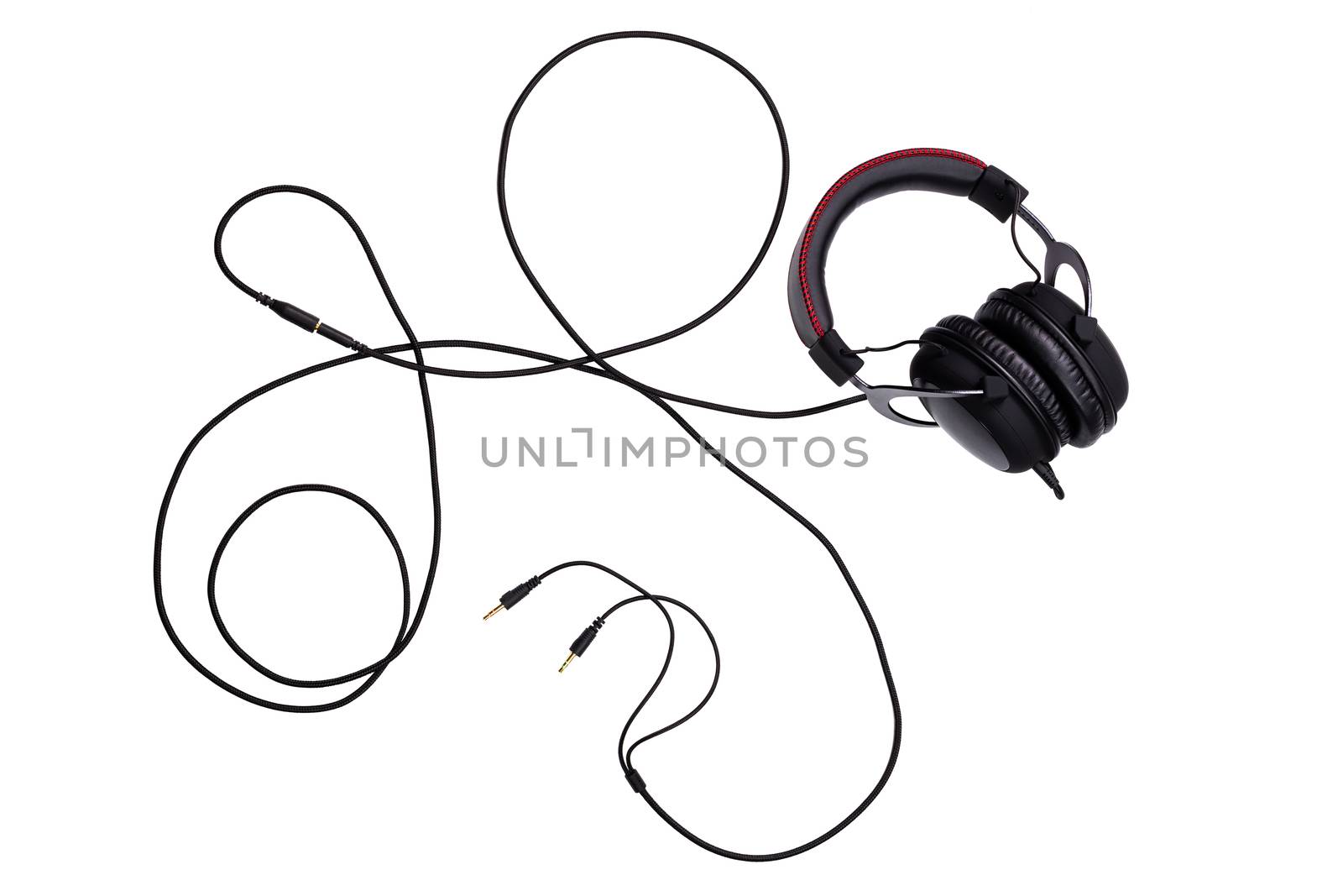 wired black gaming headset with whole wire isolated on white background in flat lay composition top-down