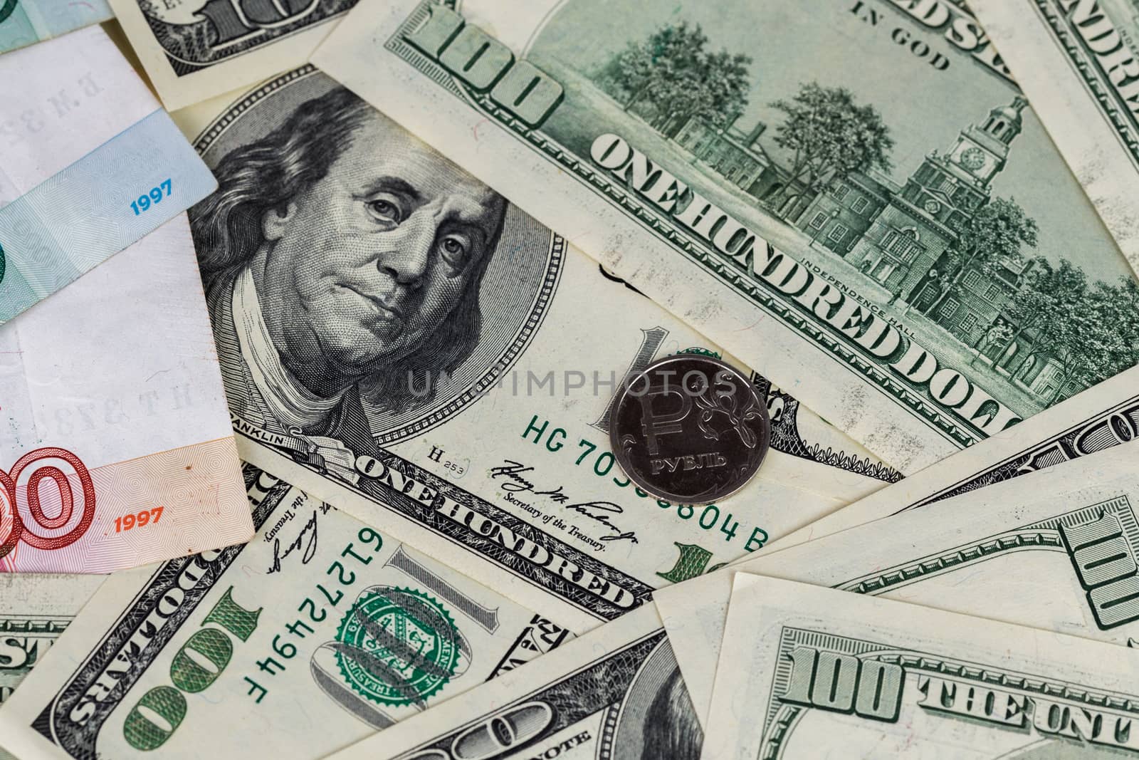 us dollars and russian rubles close-up background with selective focus.