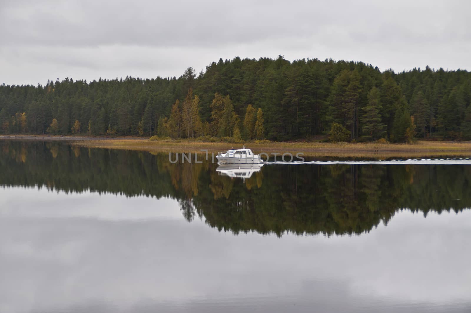 A boat on a lake in the city of Kuhmo, Finland.