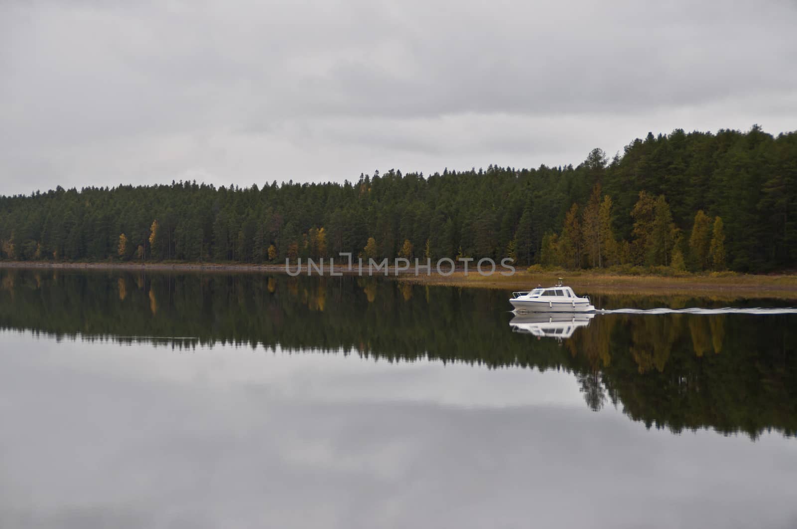 A boat on a lake in the city of Kuhmo, Finland.