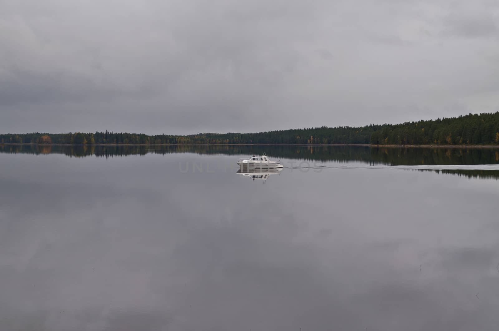 A boat on a lake in the city of Kuhmo, Finland.