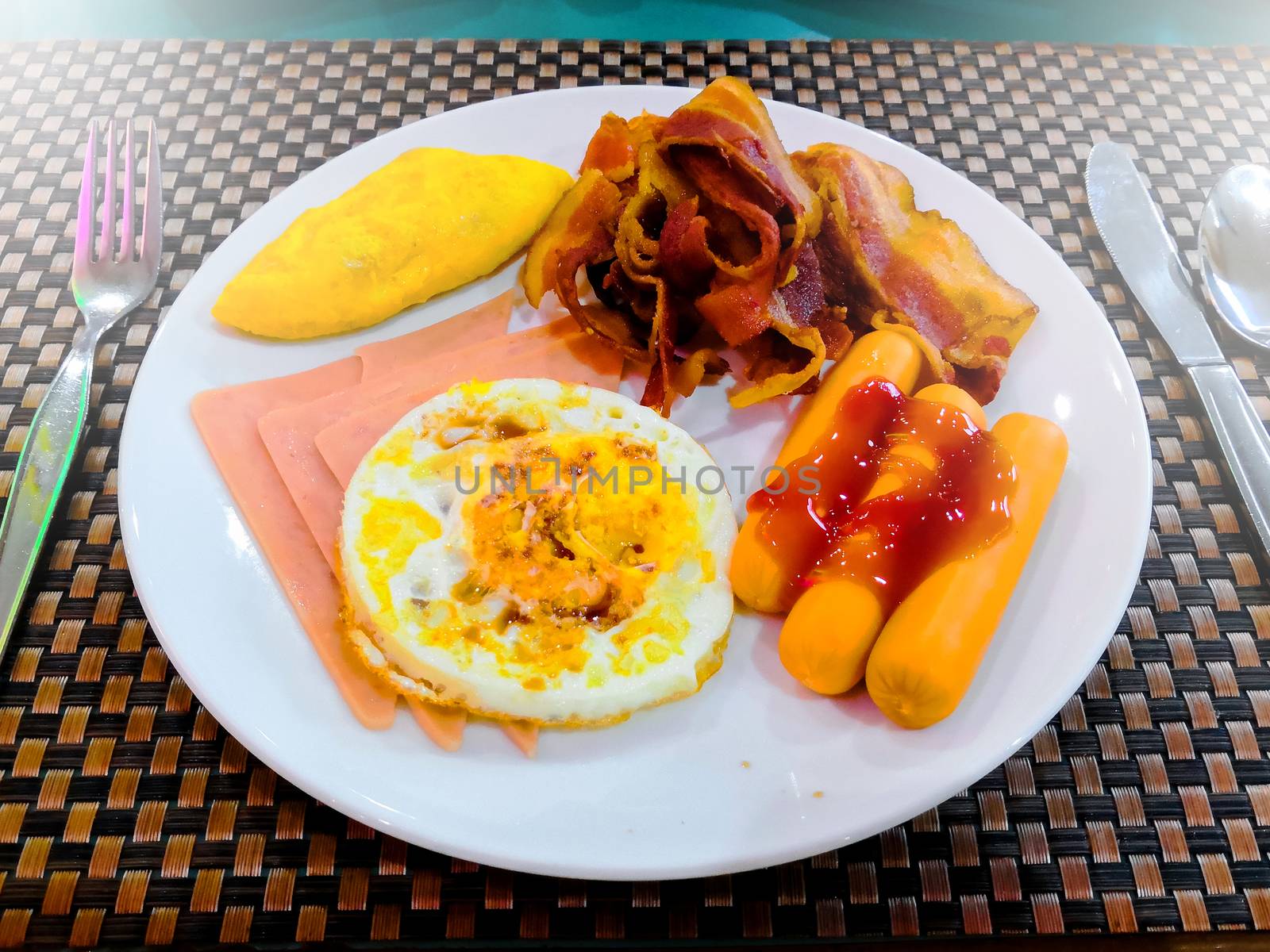 top view of breakfast on table with fork and spoon