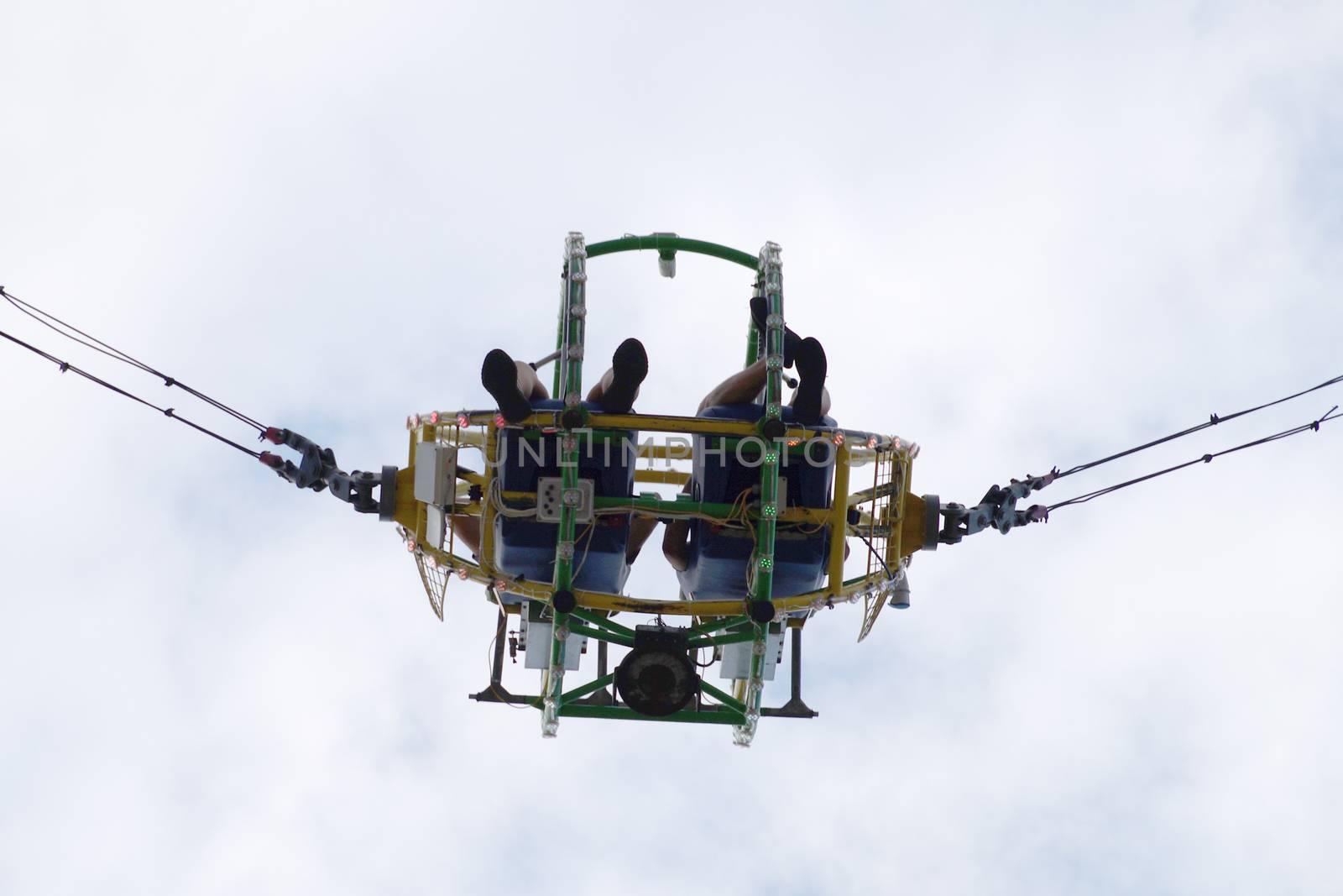 two people on the bungee ride bottom view by Annado