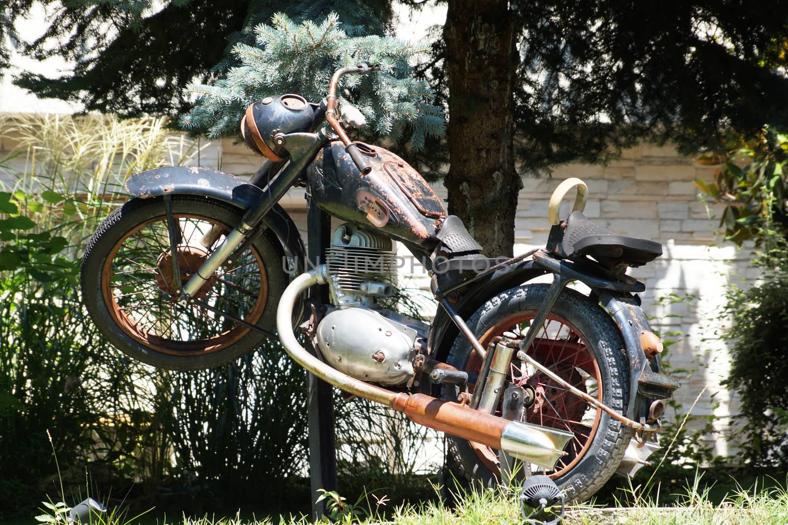Varna, Bulgaria - July,31,2020: old rusty motorcycle in the park