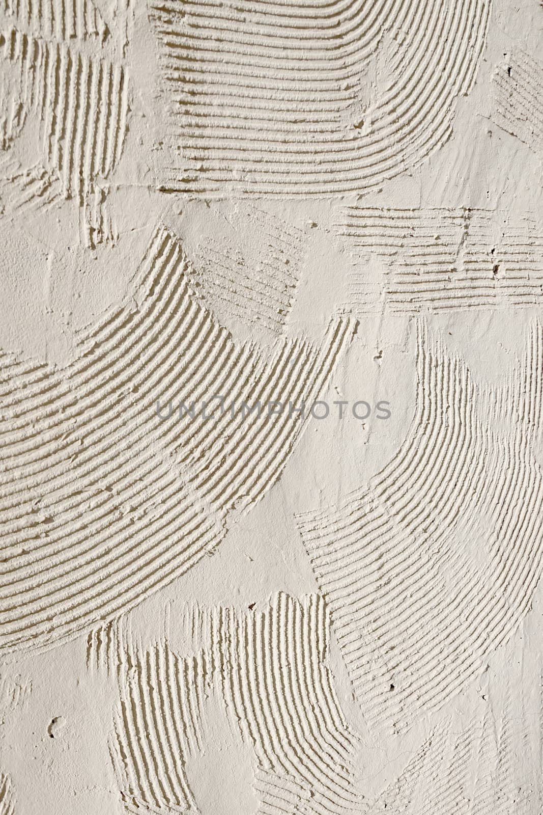 beige texture of decorative plaster for background.