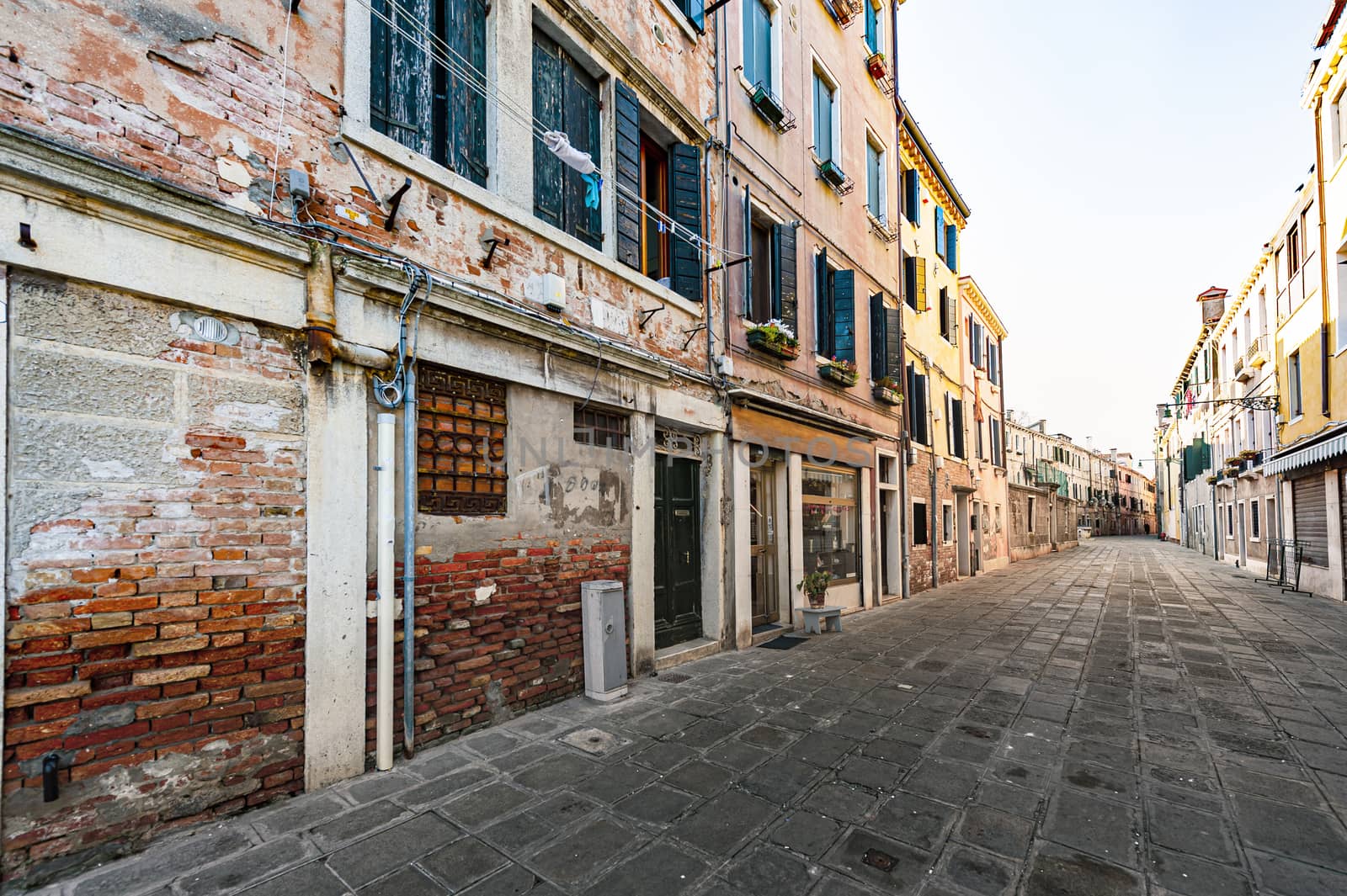 Deserted streets of Venice. Museum City is situated across a group of islands that are separated by canals and linked by empty bridges.  