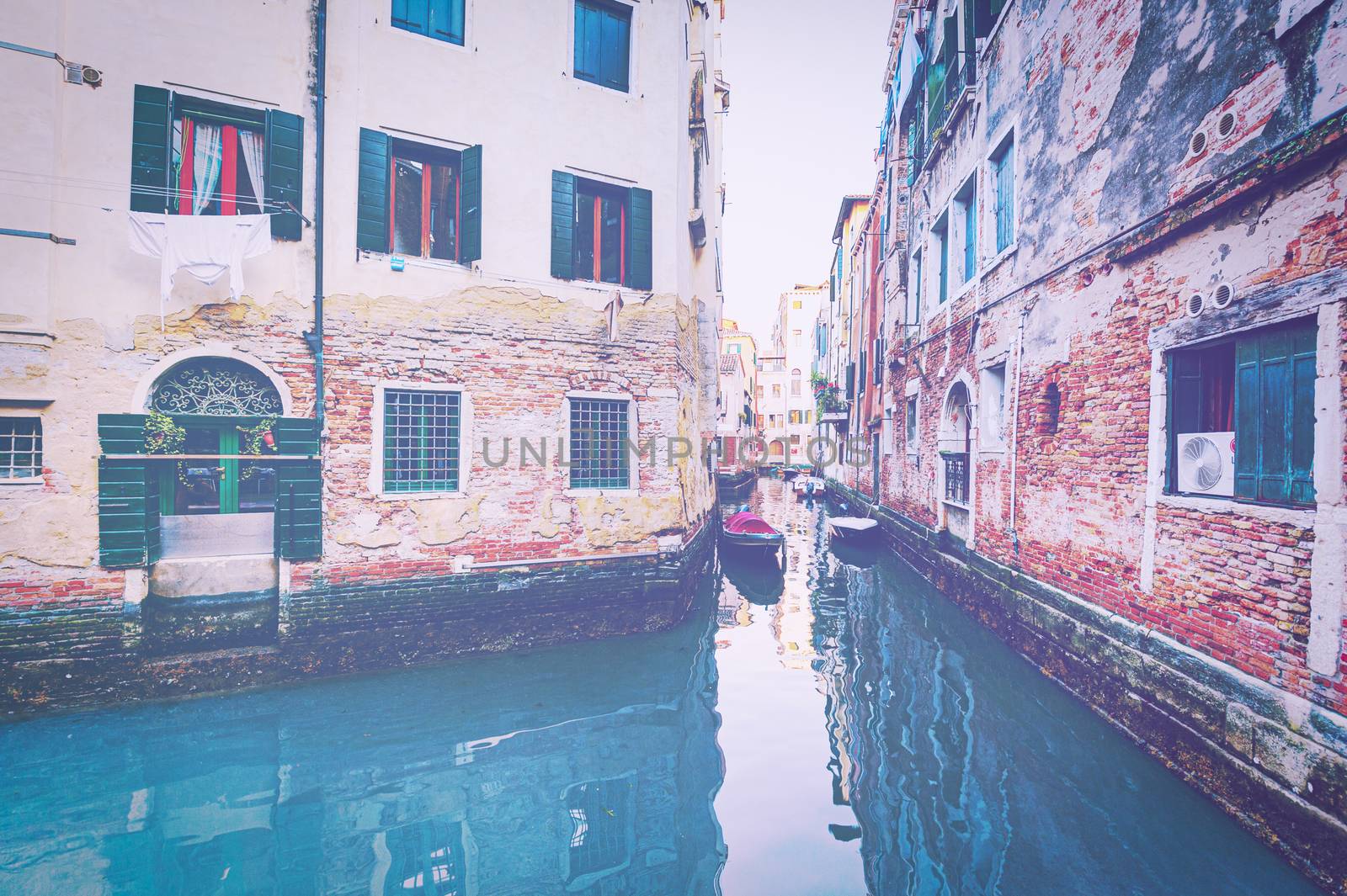 Deserted Venice in faded color effect.  Museum City is situated across a group of islands that are separated by canals and linked by empty bridges.  