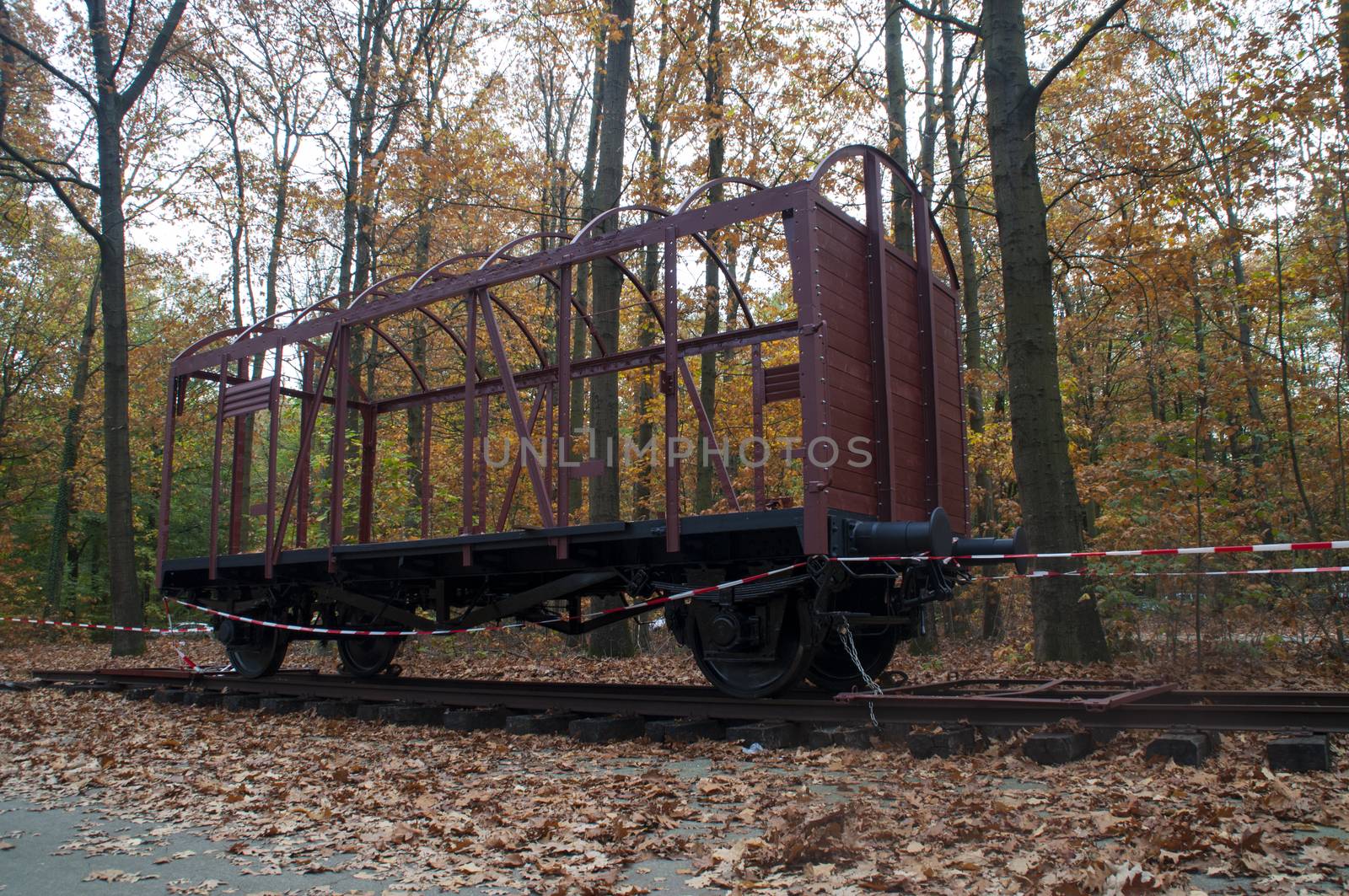 Old train wagon on the former railway track to the Westerbork transit camp, The Netherlands. by Capos