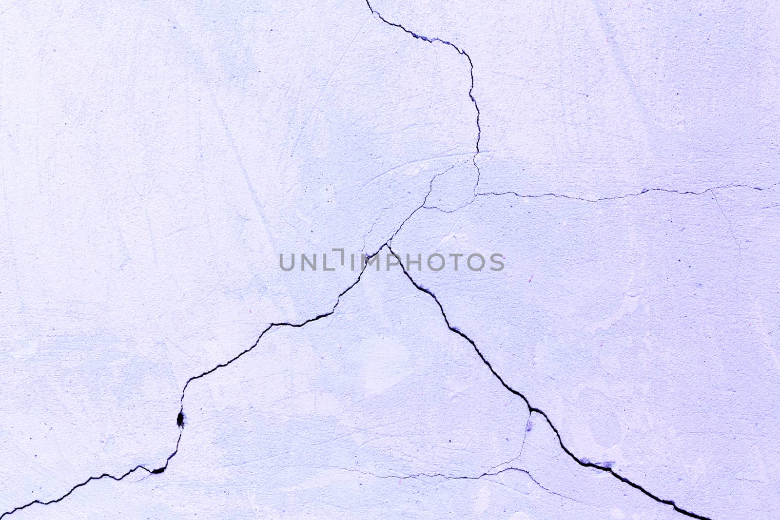 flat texture of cracked light porple plaster wall.