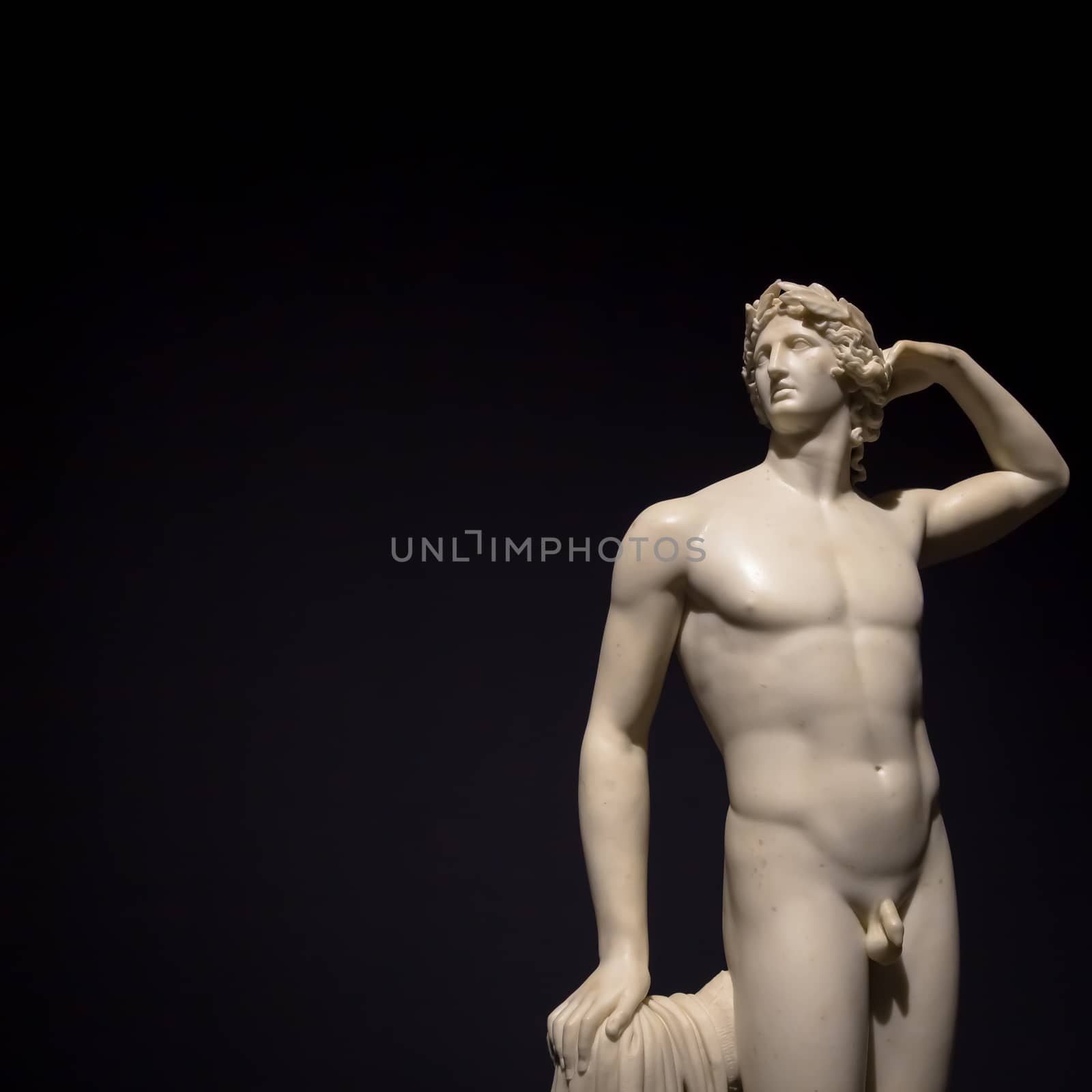 MILAN, ITALY - June 2020:  the ancient sculpture Apollo Crowing Himself - 1782 - Antonio Canova's masterpiece. Intesa Italian Museum.