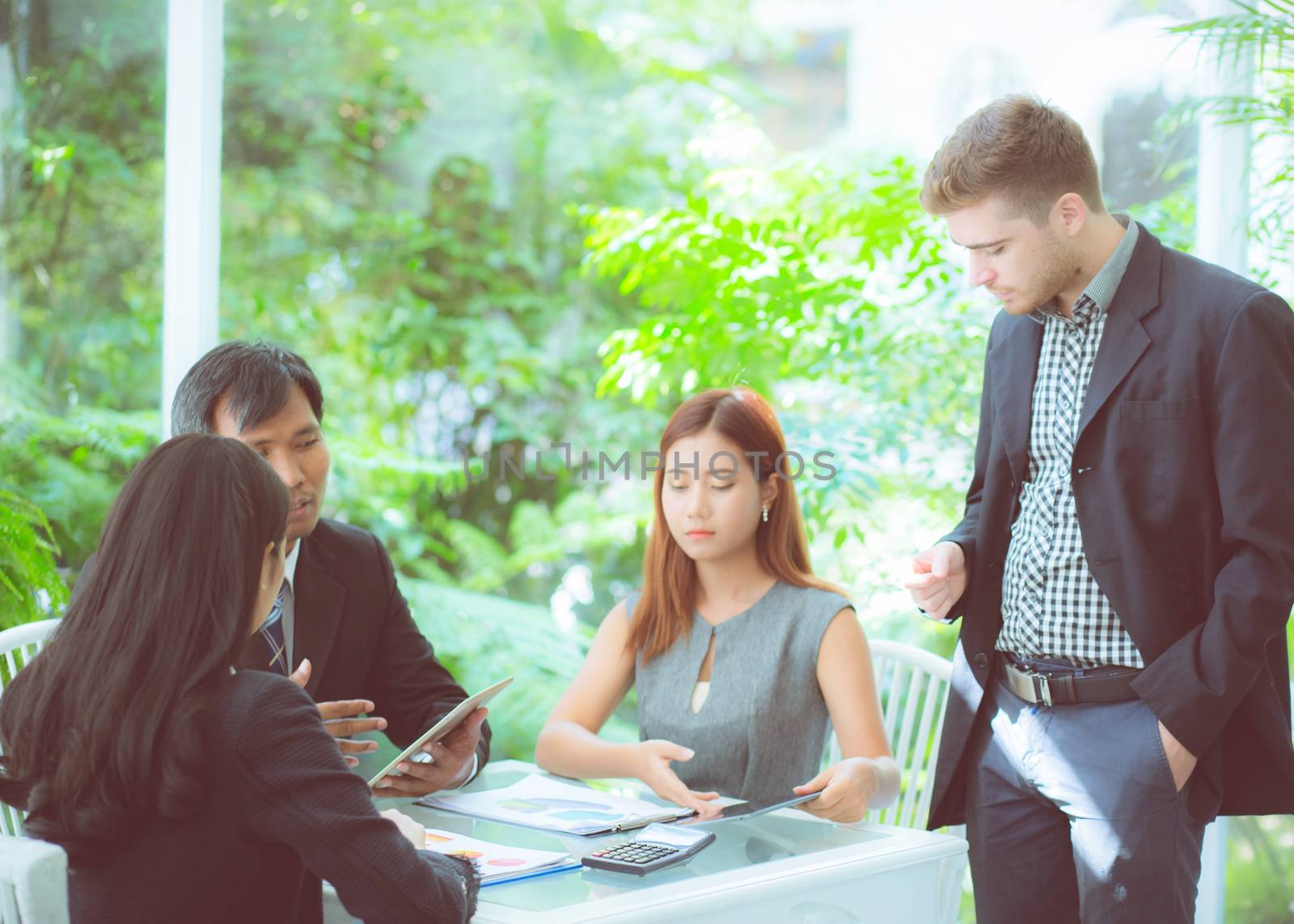 young business people making meeting and talking for analyzing marketing working at office on desk.