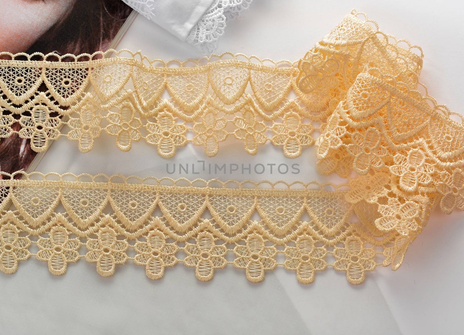 Tapes of yellow gentle guipure, beauty lace fabric. Elastic material. by polyats