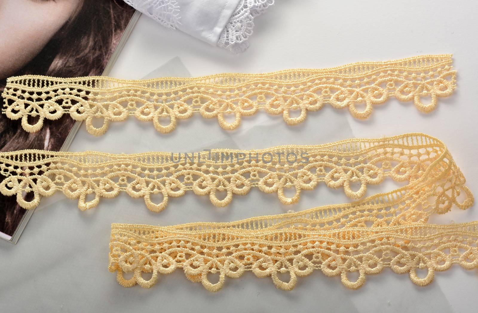 Tapes of yellow gentle guipure, beauty lace fabric. Elastic material. by polyats