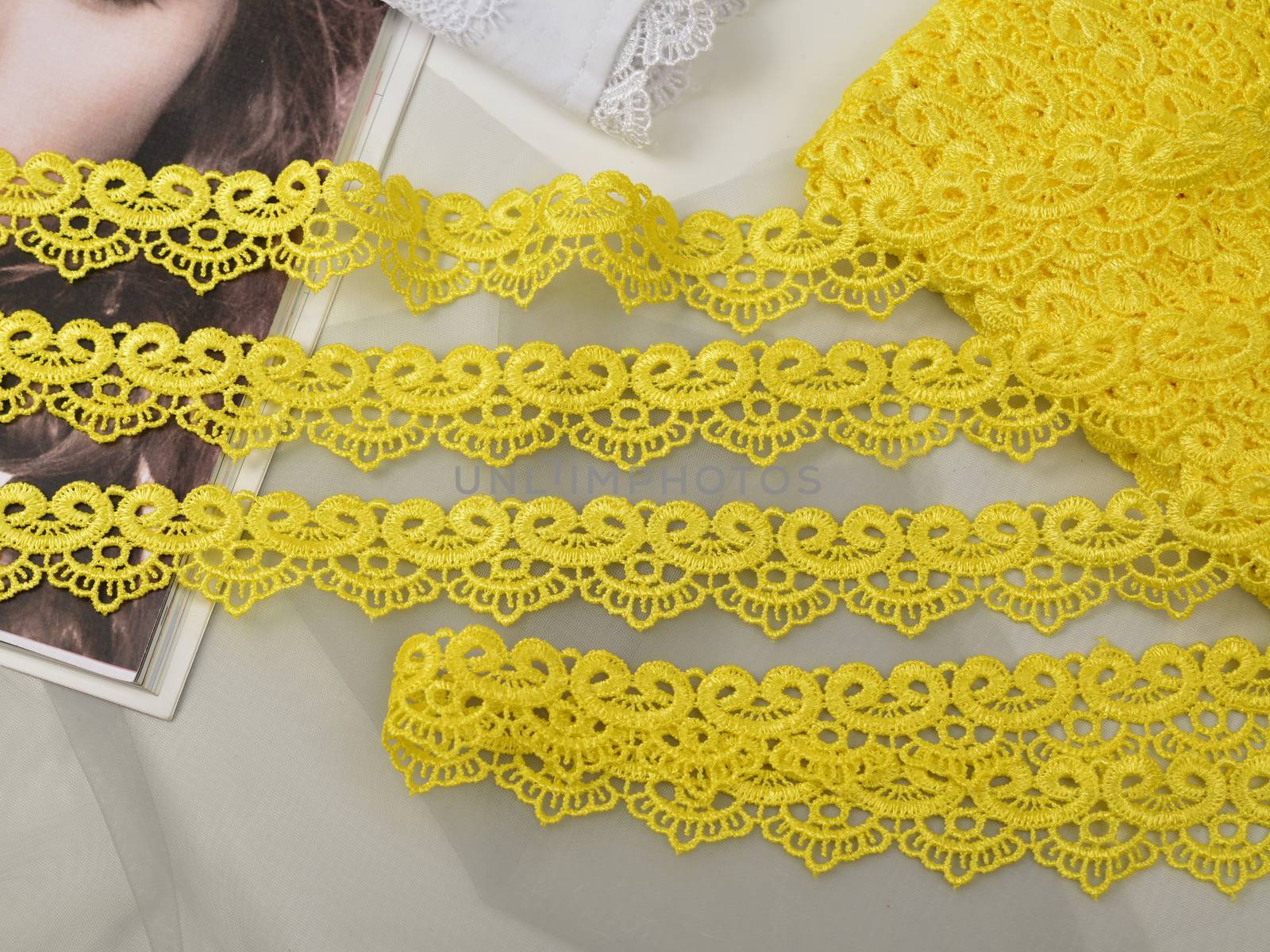 Tapes of yellow gentle guipure, beauty lace fabric. Elastic material. by polyats