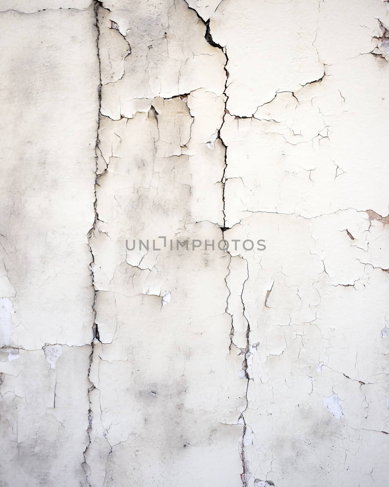 cracked white stucco on old wall by ahavelaar