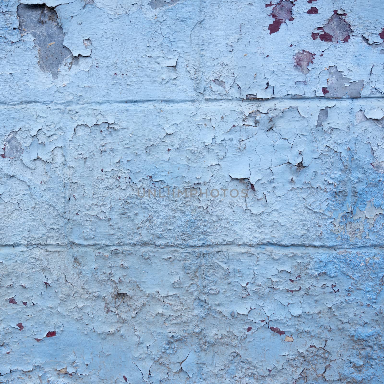 grungy blue painted cracked part of outside wall by ahavelaar