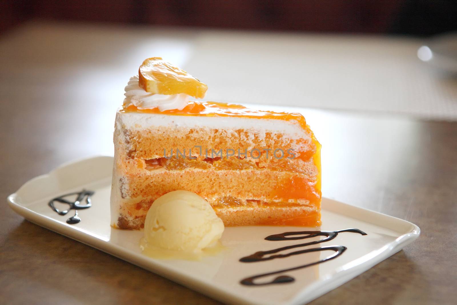 Orange cake on wood background