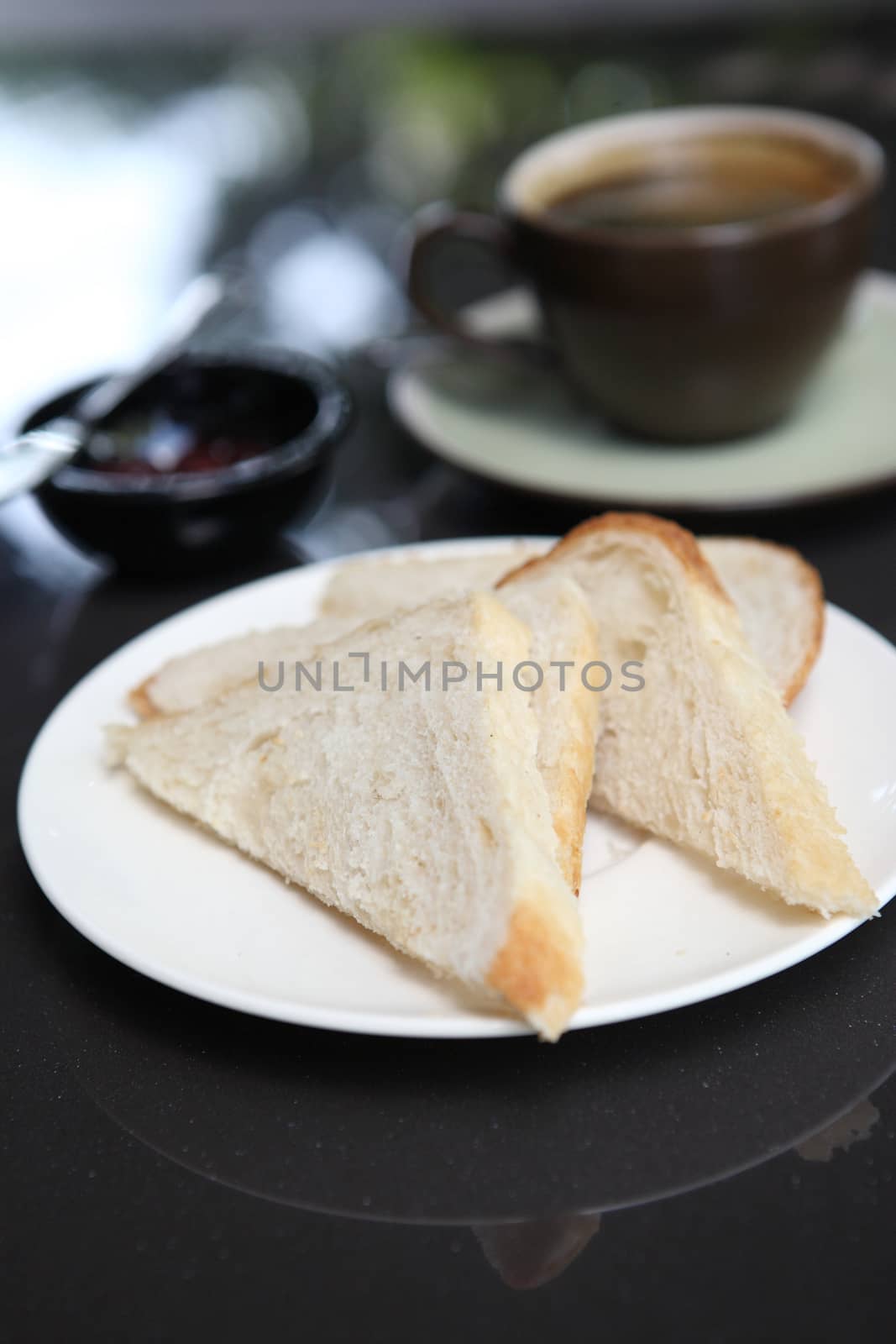 slice of bread with coffee