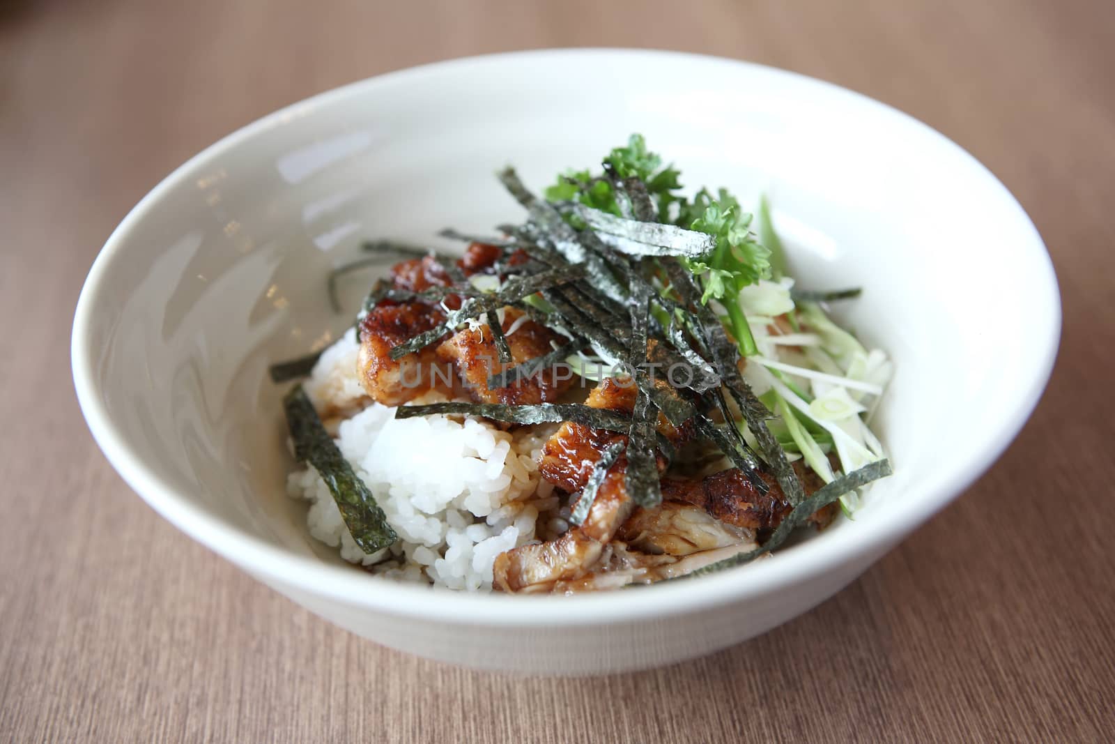 Grilled Chicken teriyaki rice on wood background