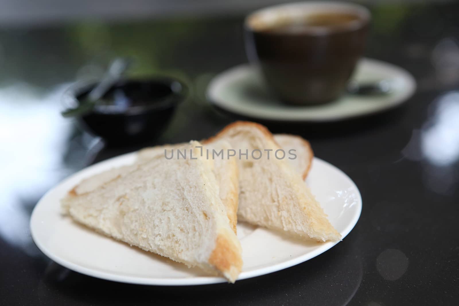 slice of bread with coffee