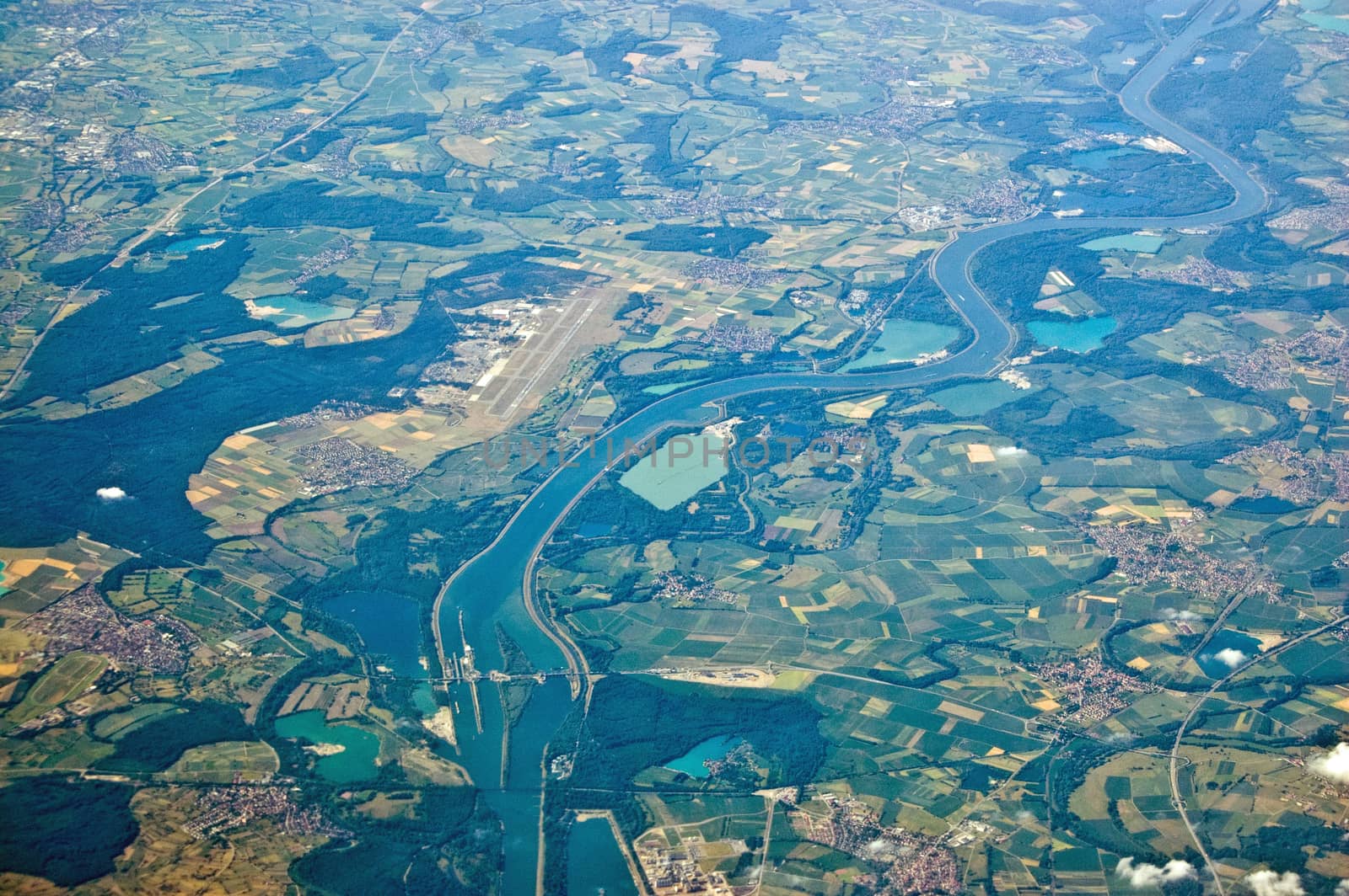 View from the air of the Iffezheim Barrage on the upper River Rhine. The barrage produces hydroelectricity. Beyond is Karlsruhe-Soellingen airport.