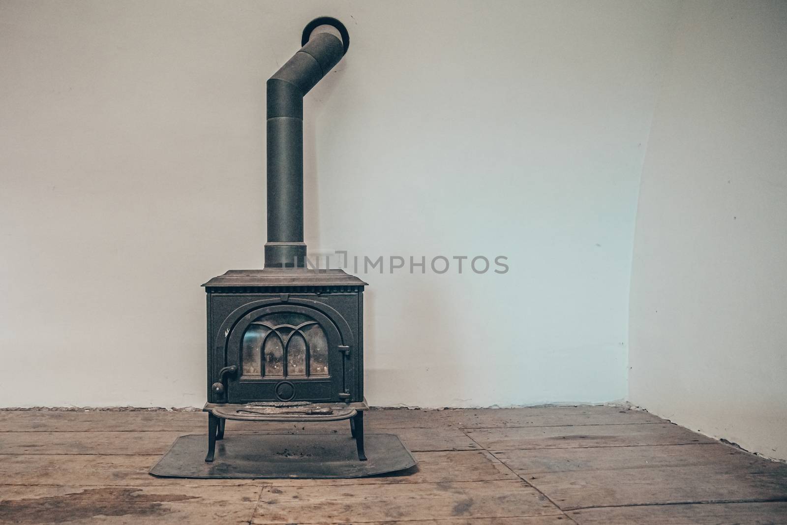old stove in empty room