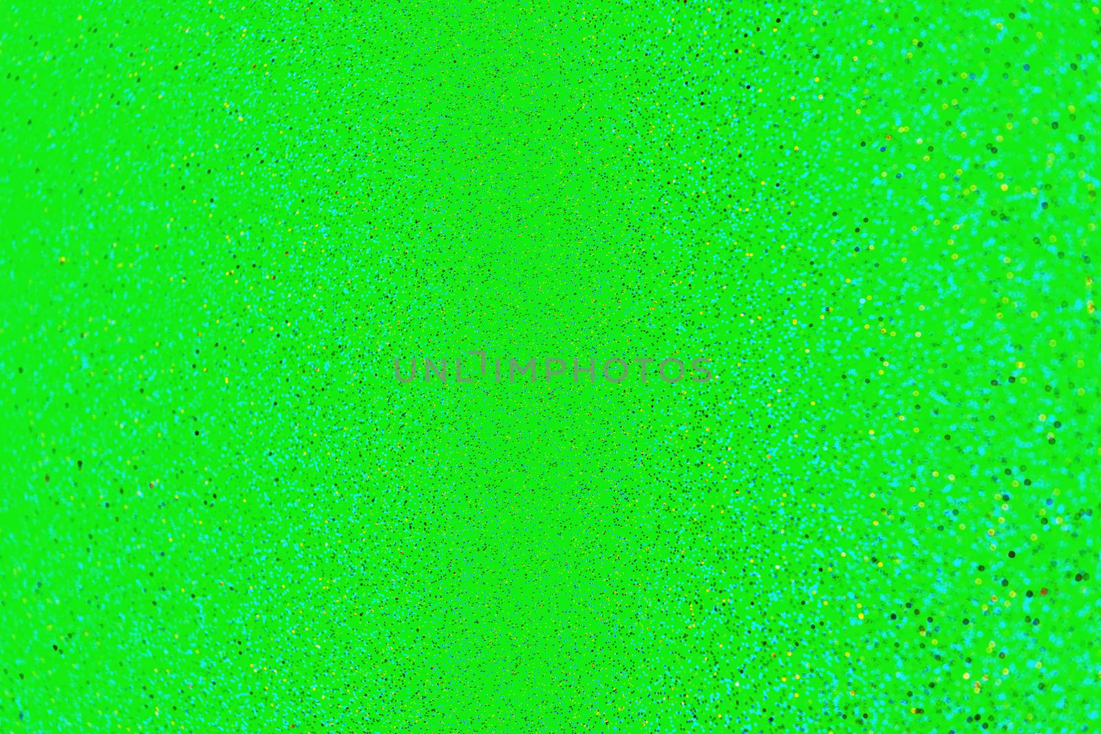 abstract natural small spots lens blur on acid green autogenic background with selective focus.