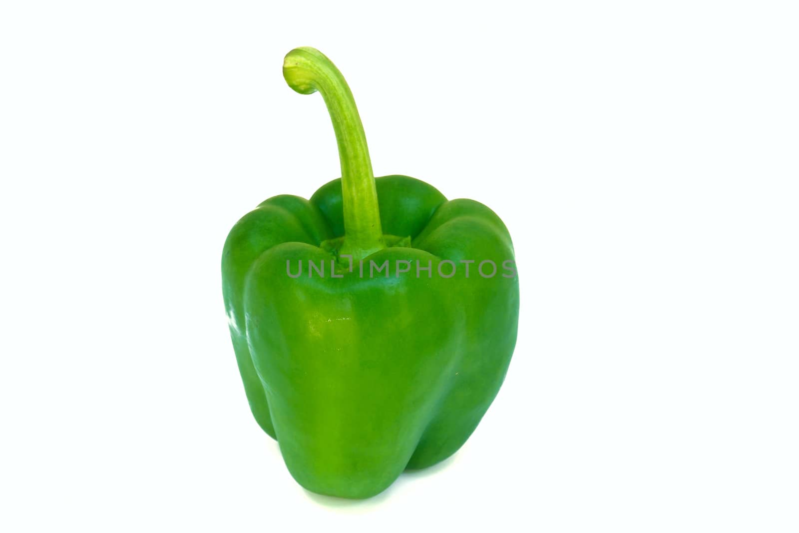 Green bell pepper isolated on a white background