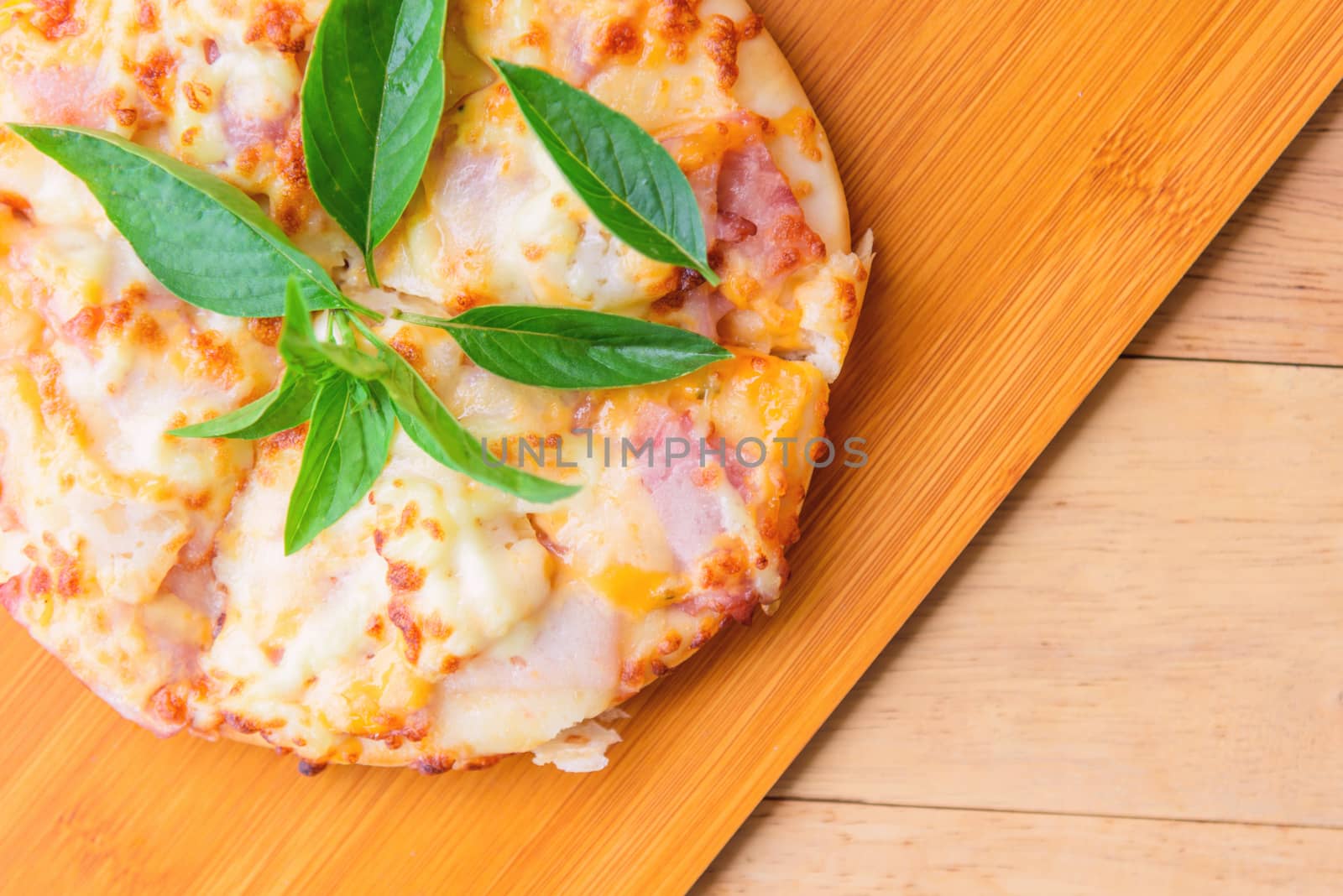 Home made pizza on wood plate by rukawajung