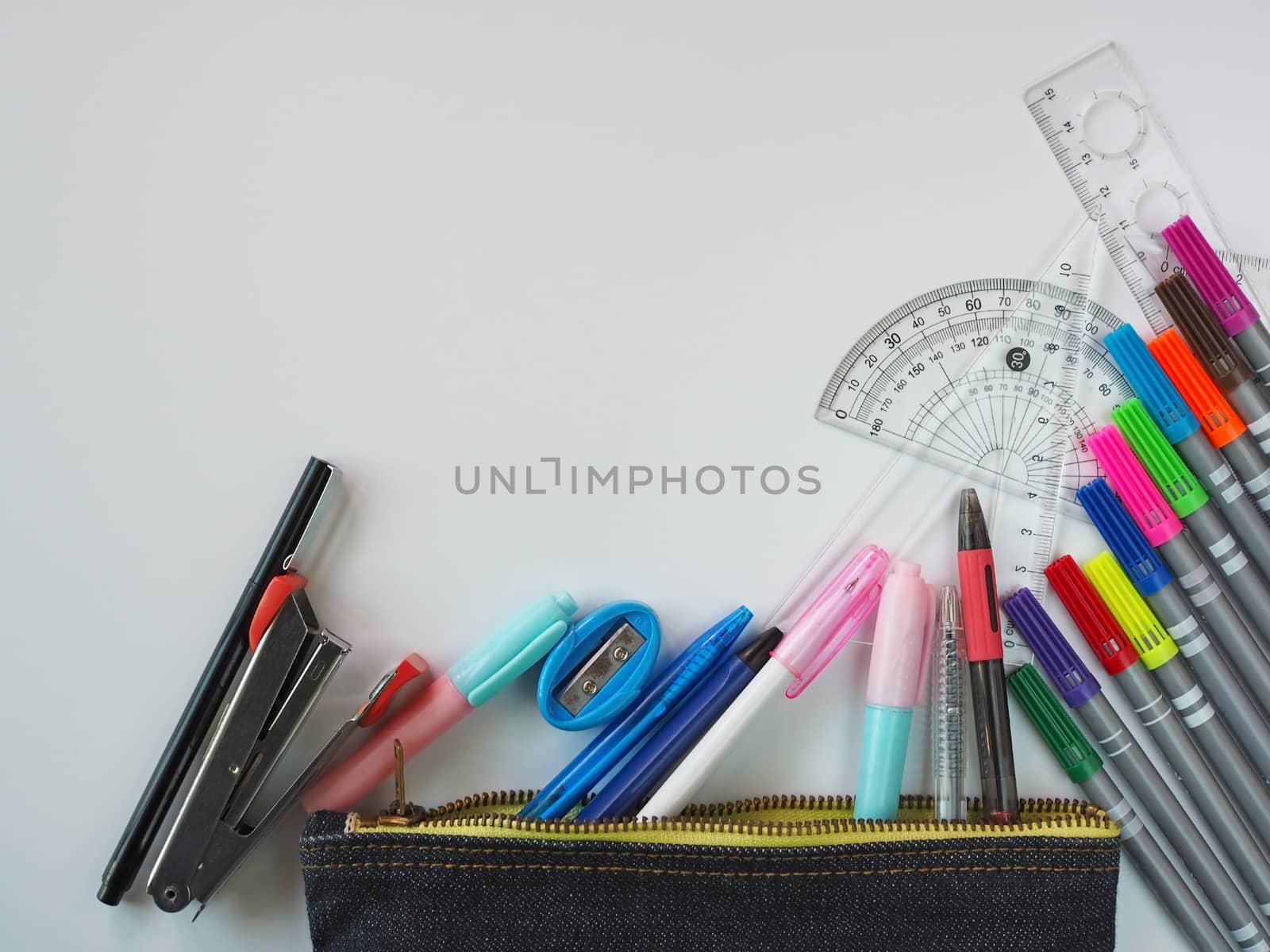 School supplies Placed on a white background in the top view pattern And have free space. by Unimages2527