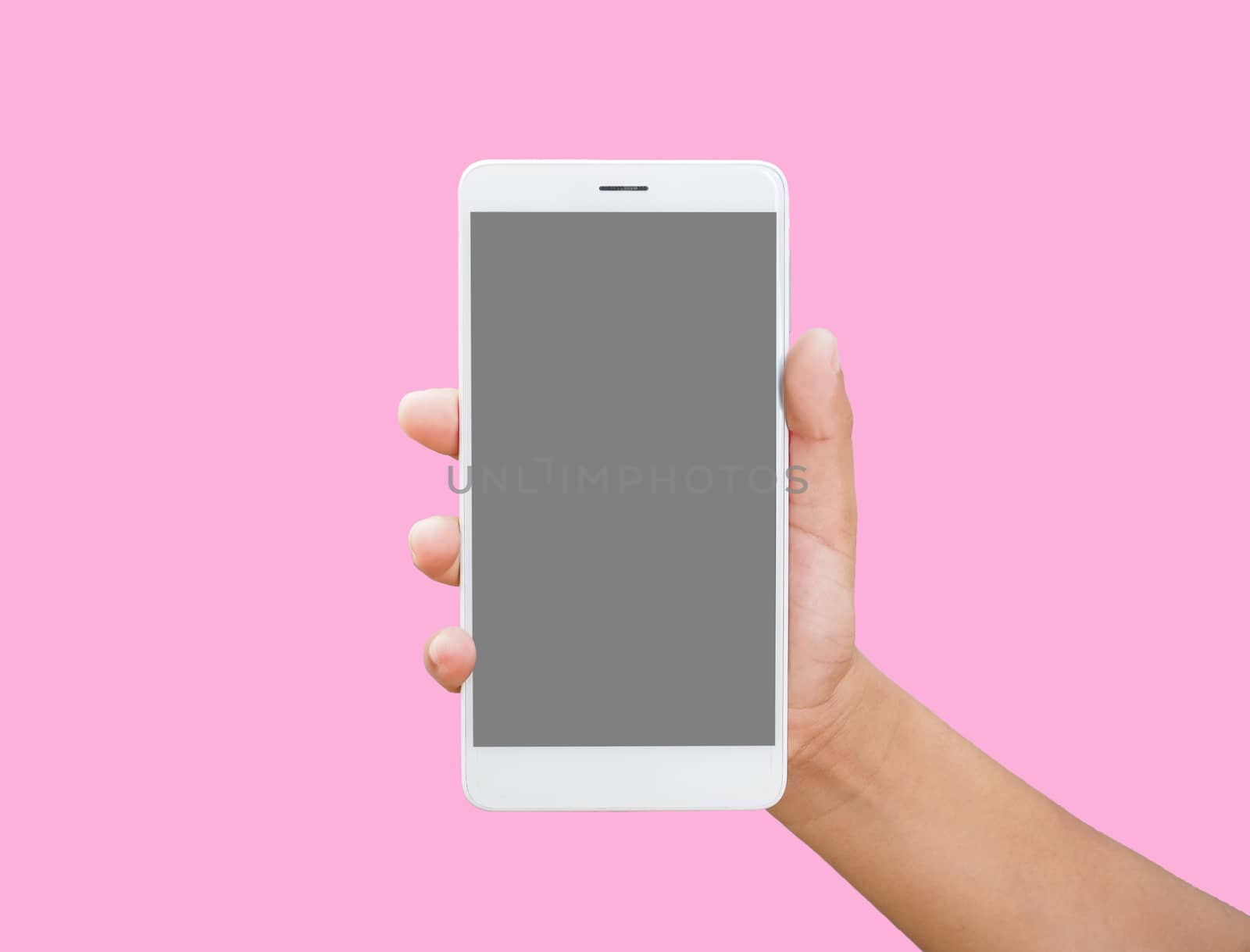 Human hand holding blank screen smart phone isolated on pink background. by Unimages2527