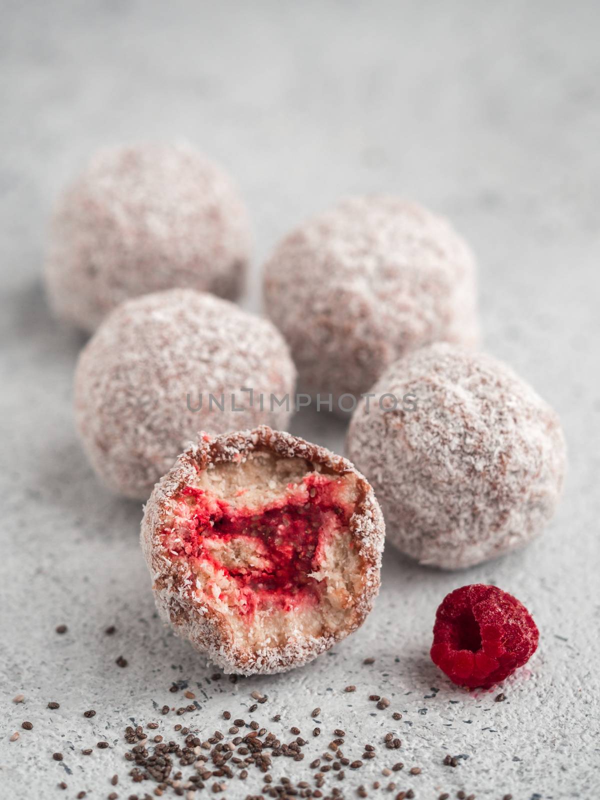 Raw lamington bliss balls with raspberries chia jam by fascinadora