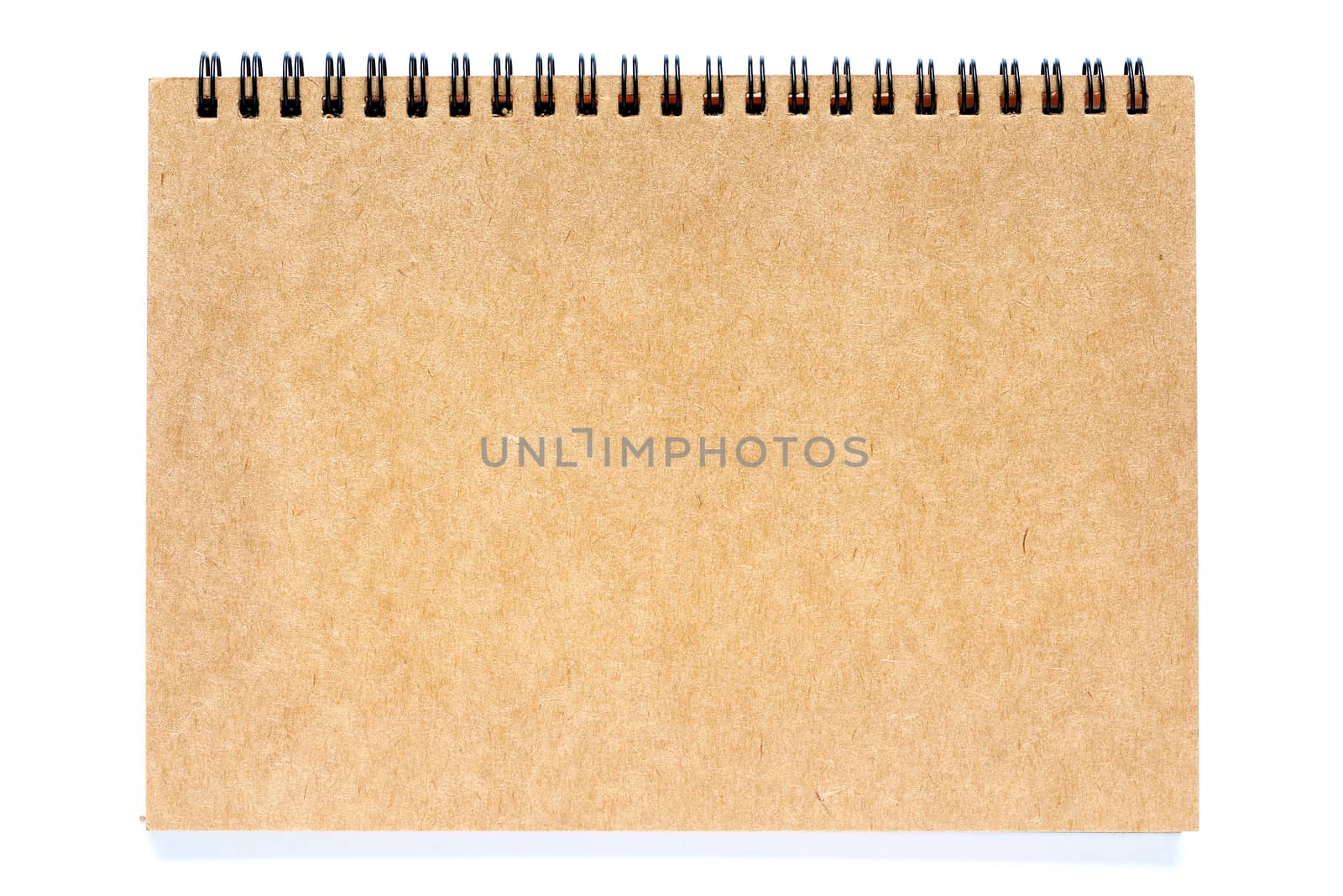 Brown spiral notebook on isolated white background